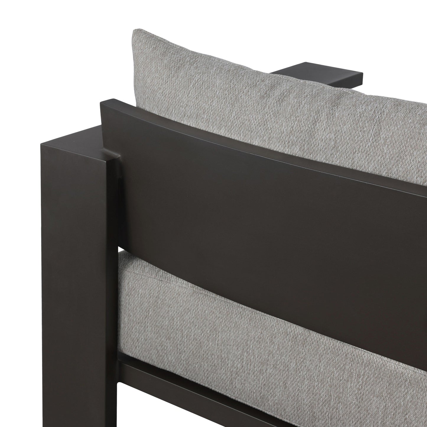 Close-up of the back corner of the Aluminum Angular Detailing | Outdoor Sofa, featuring a traditional silhouette with deep bronze aluminum framing and light gray textured cushions.