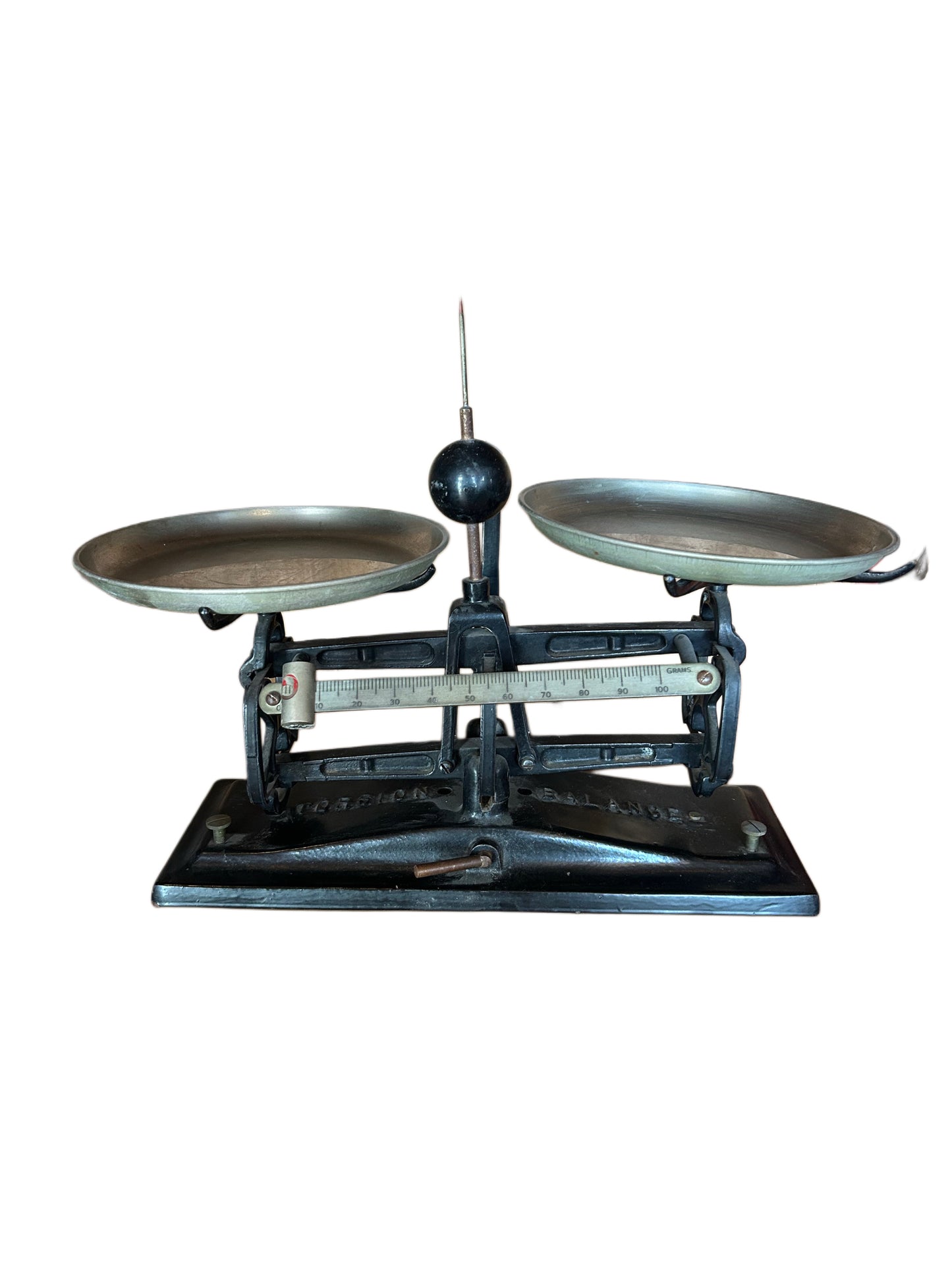 The Vintage Scale is a black and silver mechanical balance scale featuring two round metal weighing pans and a central dial, shown isolated against a white background.