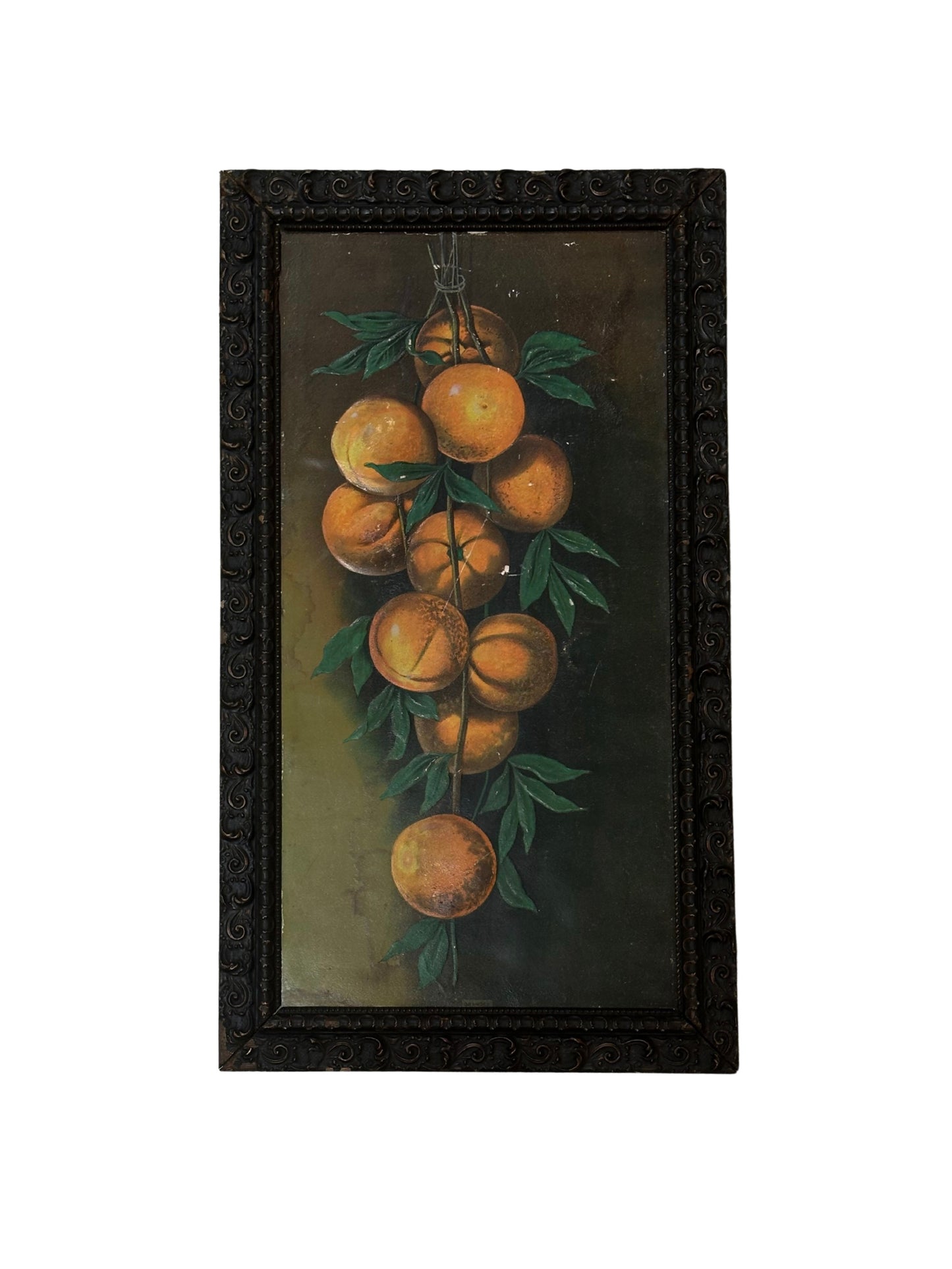 A stunning framed art piece, the Peaches Painting showcases juicy peaches with green leaves on a dark background. The ornate black frame with decorative patterns adds elegance to any room.