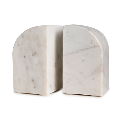 Marble Bookends with a modern geometric design and curved tops sit side by side on a white background, paired with a small decorative vase for a chic display.