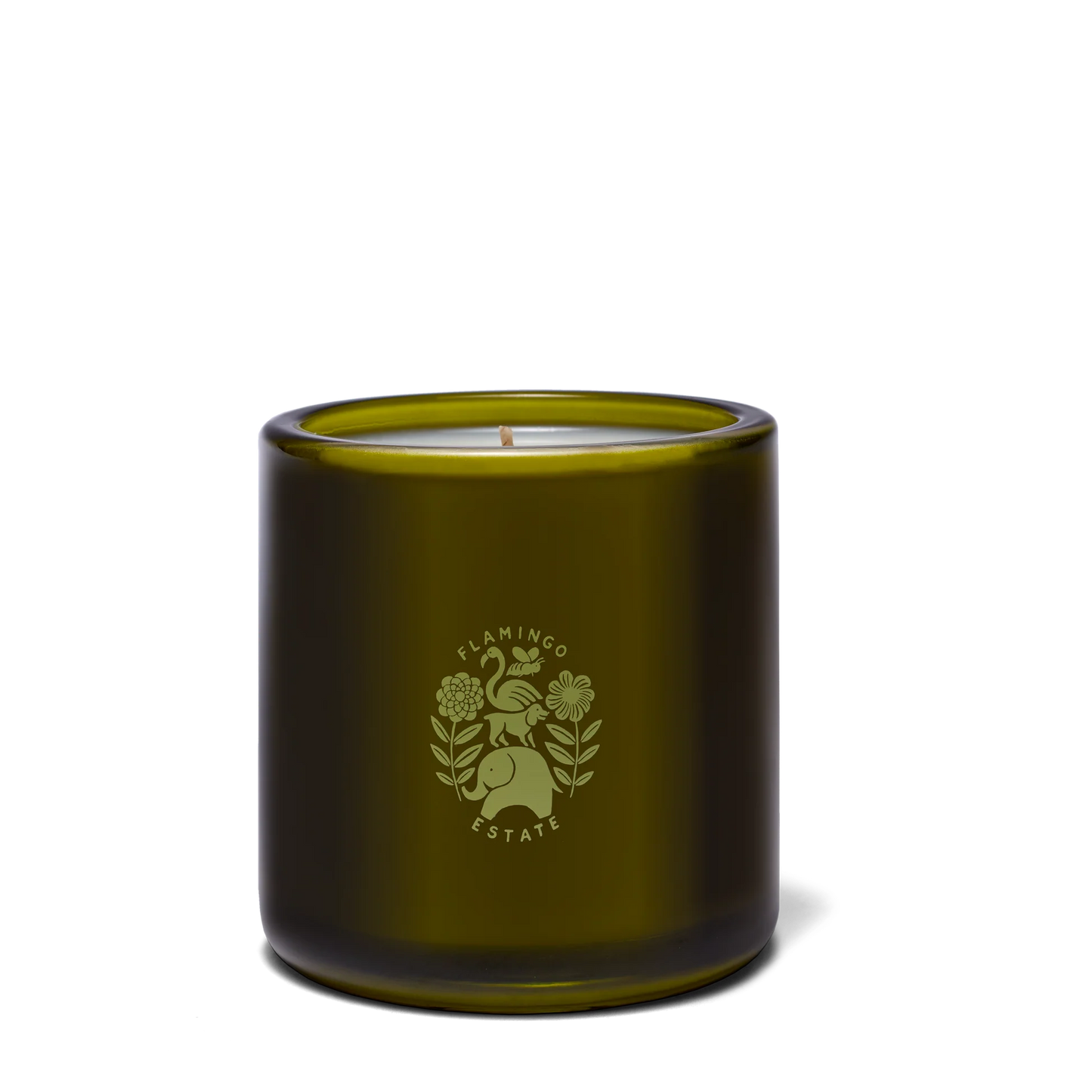 A green glass jar candle from Flamingo Estate with white wax and a logo of a flamingo, pear, flowers, and leaves. The label features Night Blooming Jasmine & Damask Rose scents.