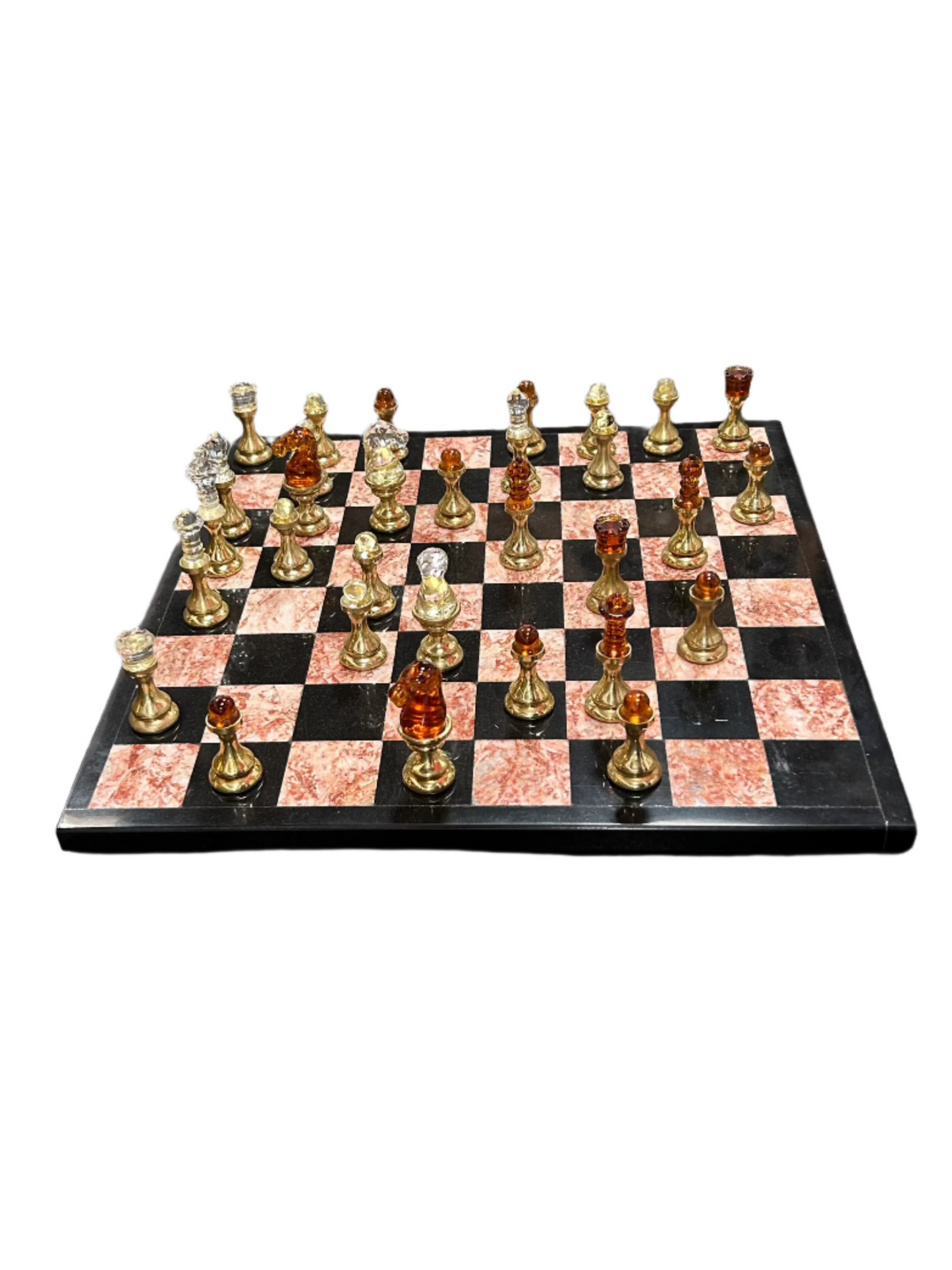 The Vintage Marble Brass Chess Set features a 14-inch square tray styled as a chessboard with black and pink marble squares and ornate gold and silver chess pieces, beautifully arranged for play against a white background.
