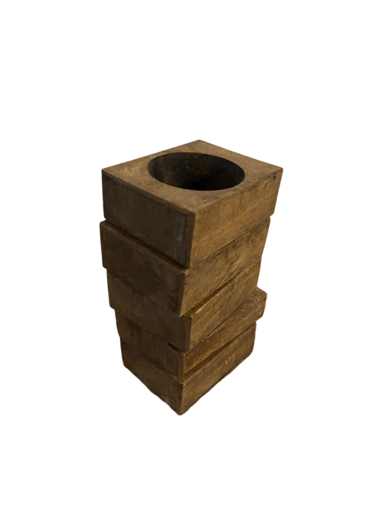 The Small Square Wood Block Dish features a square base and round opening, with an uneven, layered carved wood design that combines functional beauty and artistry. The photo shows the dish on a plain white background.