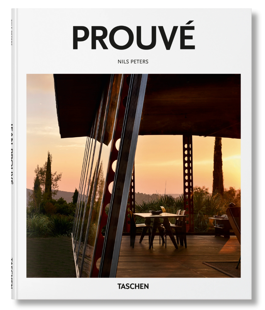 The cover of Prouvé (Basic Art Edition) features Jean Prouvé’s modernist design—glass walls, metal beams, outdoor seating, and greenery at sunset. Published by Taschen, it’s a tribute to midcentury architecture and design.