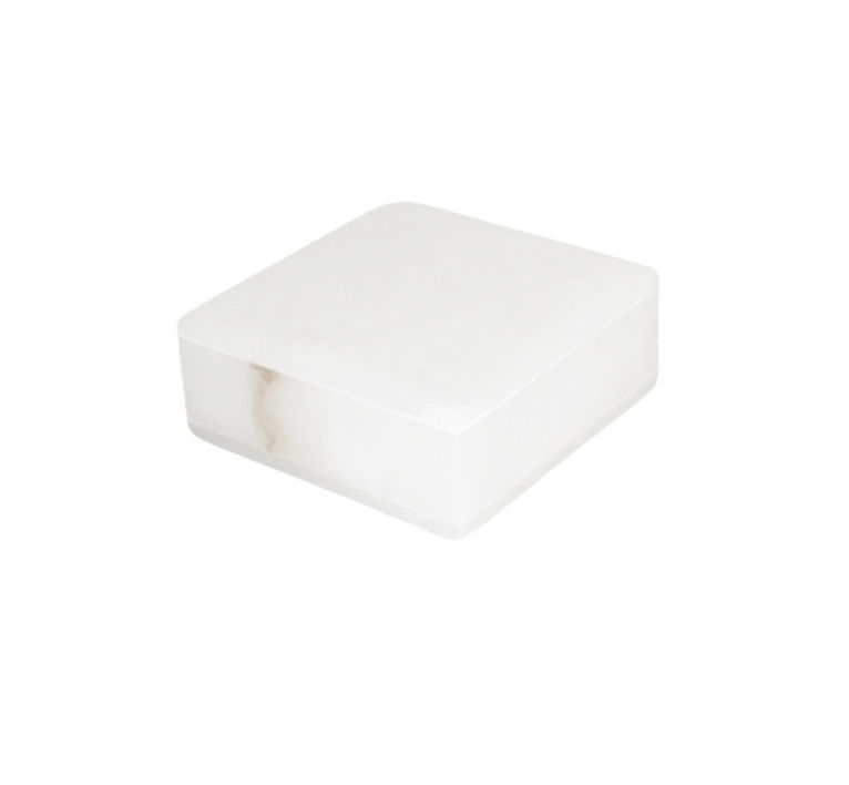 The Small Alabaster Square Box is a white, square decorative tabletop piece with smooth sides and gently rounded edges, offering a timeless look for any space.
