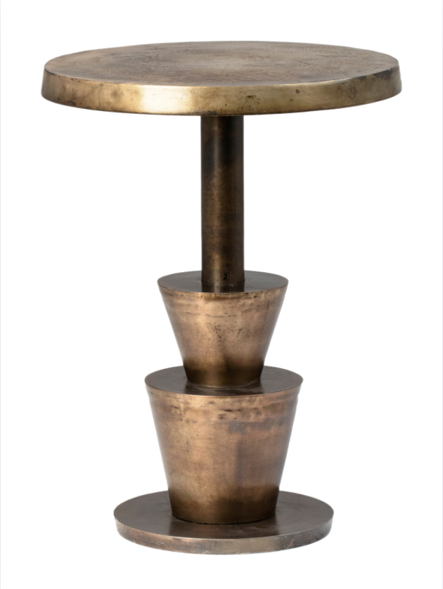 The Vintage Side Table features a small, round, bronze aluminum top, central support, and two inverted cones above a circular base—all in an antique brass finish.