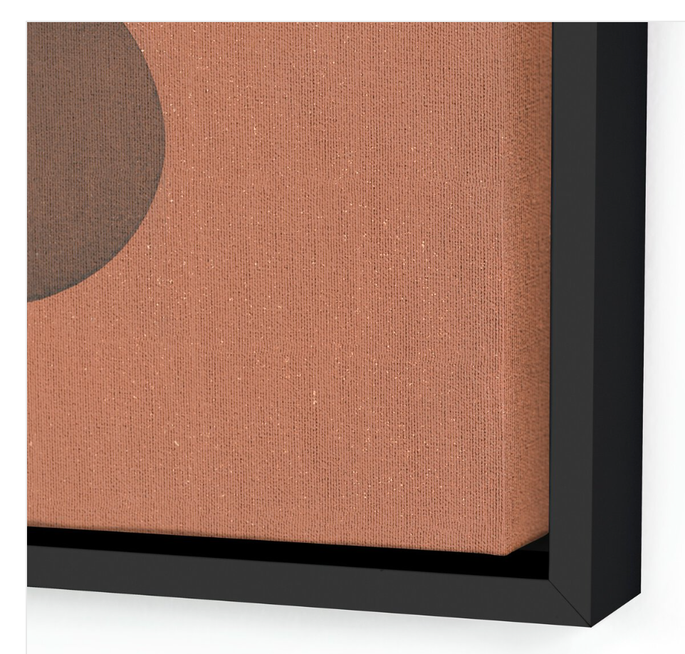 Close-up of the corner of a framed canvas art piece, "Mesa Roja"—a modern minimalist geometric wall art with a peach background and partial dark circle in a thin black frame. Canvas texture is visible.