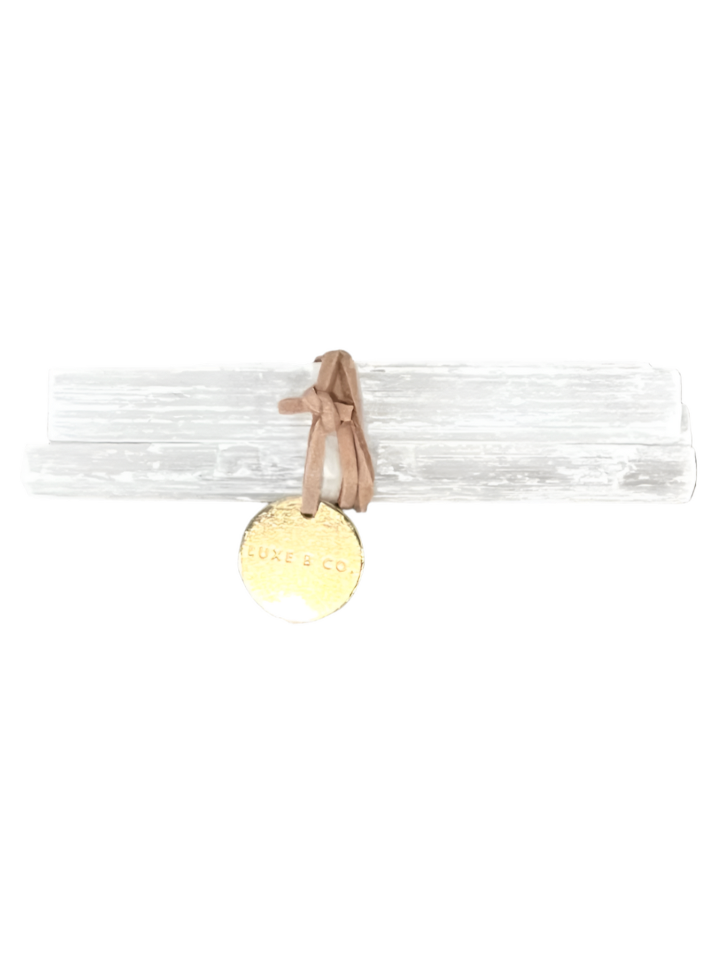 Selenite Bundle of 3: Three 4-inch white selenite crystal sticks tied with a light brown leather cord, featuring a round gold “LUXE B CO” tag on a white background.