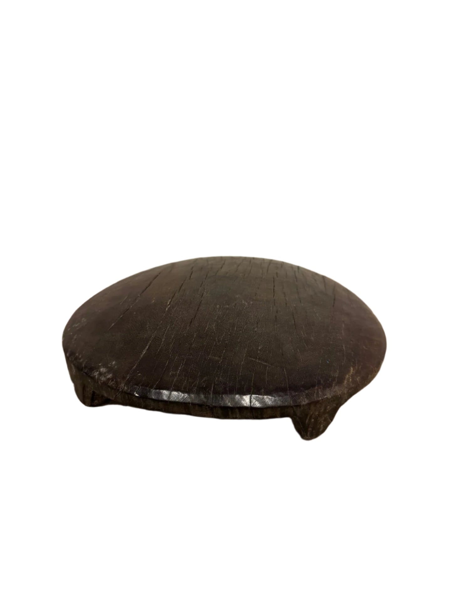 The Dark Wood Chapati Board is a round, flat platform with short legs, measuring 13 inches in diameter. It features visible cracks and textured grain on its surface and is photographed against a white background.
