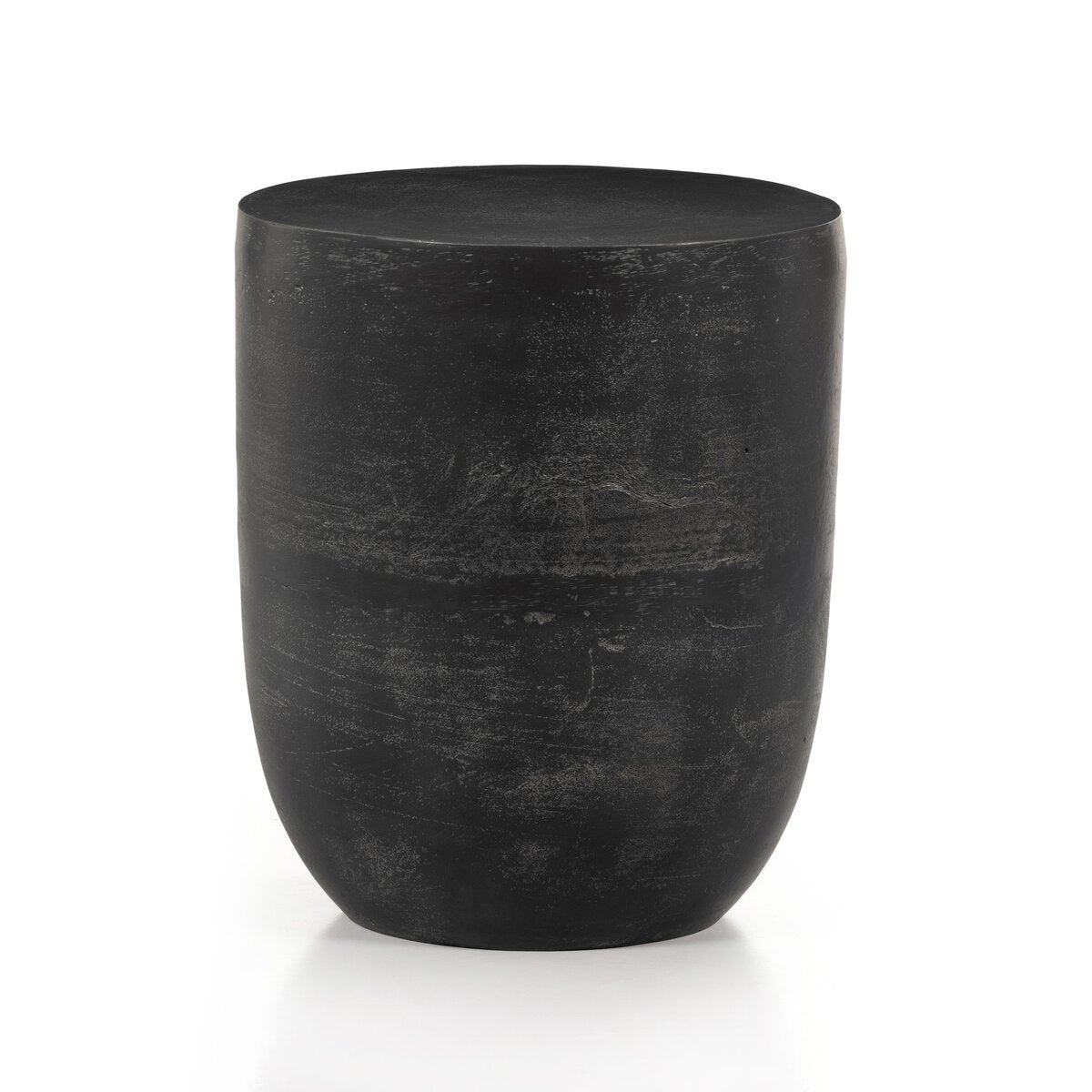 The Copper Round Side Table is a sleek, round accent piece with a smooth top and gently tapered sides, shown against a plain white background.