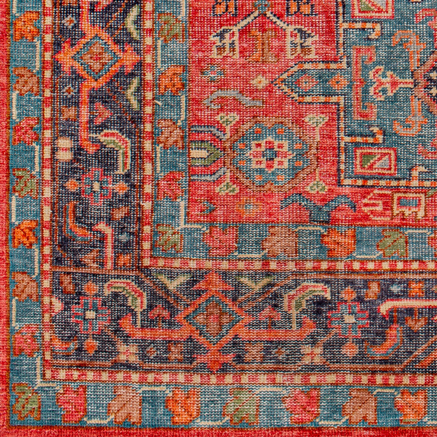 The Traditional Indian Colorful Rug - 8'x10' features ornate geometric and floral patterns in vibrant red, blue, orange, and green hues, bordered by intricate designs—perfect for adding a vivid touch to your space.