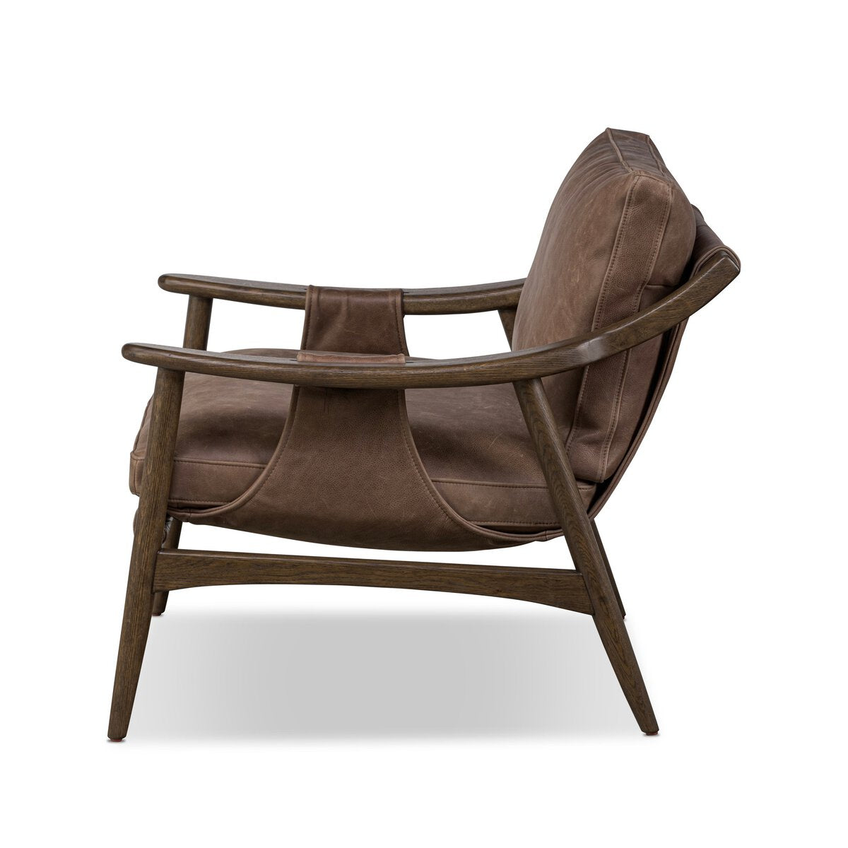 Side view of the Sling Style Armchair, featuring a wooden frame, brown leather cushions, angled legs, and wide armrests. Overall dimensions: 32.75"w x 34.75"d x 30.75"h. Displayed against a white background.