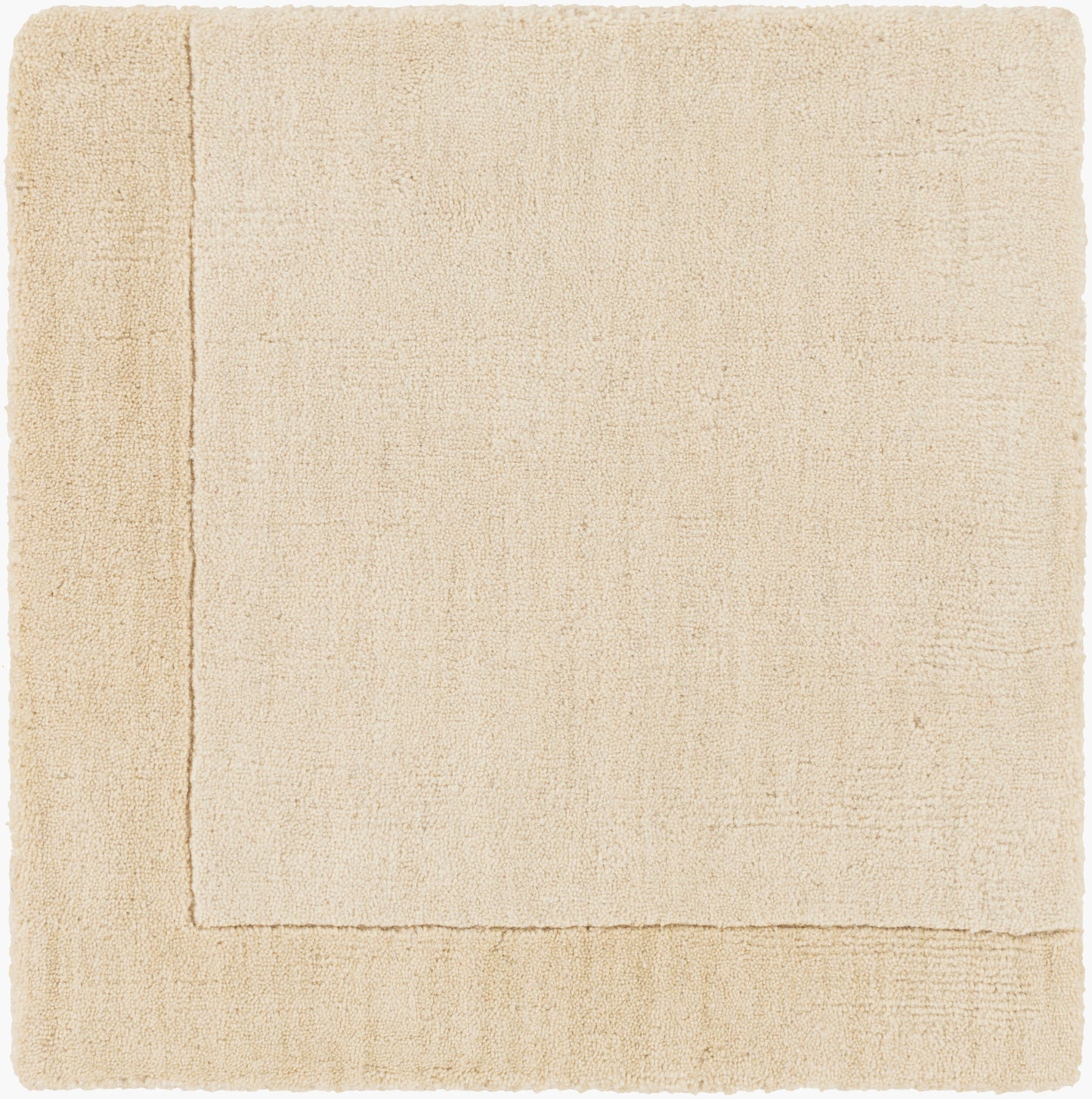 The Subtle Border Ivory Rug, measuring 8' x 11', is a rectangular wool area rug in beige with a subtle border pattern, shown flat on a white background.