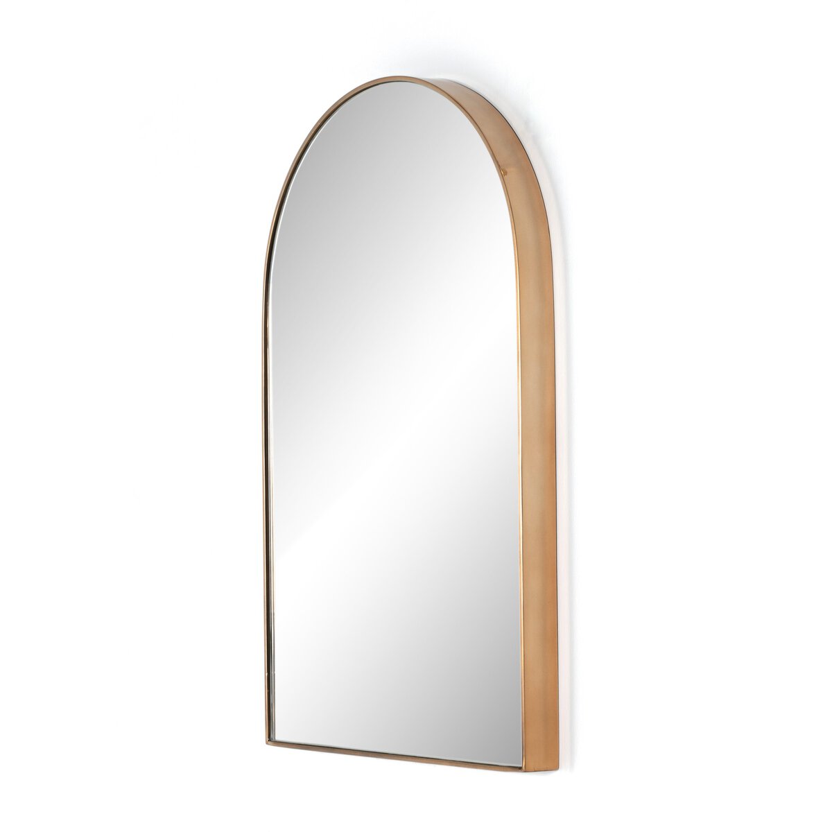 The Georgina Small Mirror features an arched design with a thin metallic gold frame, photographed against a white background from a slight side angle. Overall dimensions: 21x32 inches.