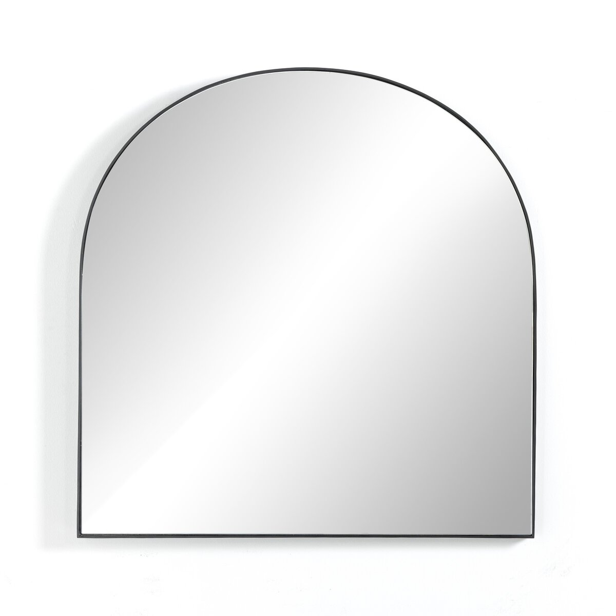 The Georgina Wide Mirror features an arched design with a thin black frame, a flat bottom edge, and a curved top, displayed against a plain white background.