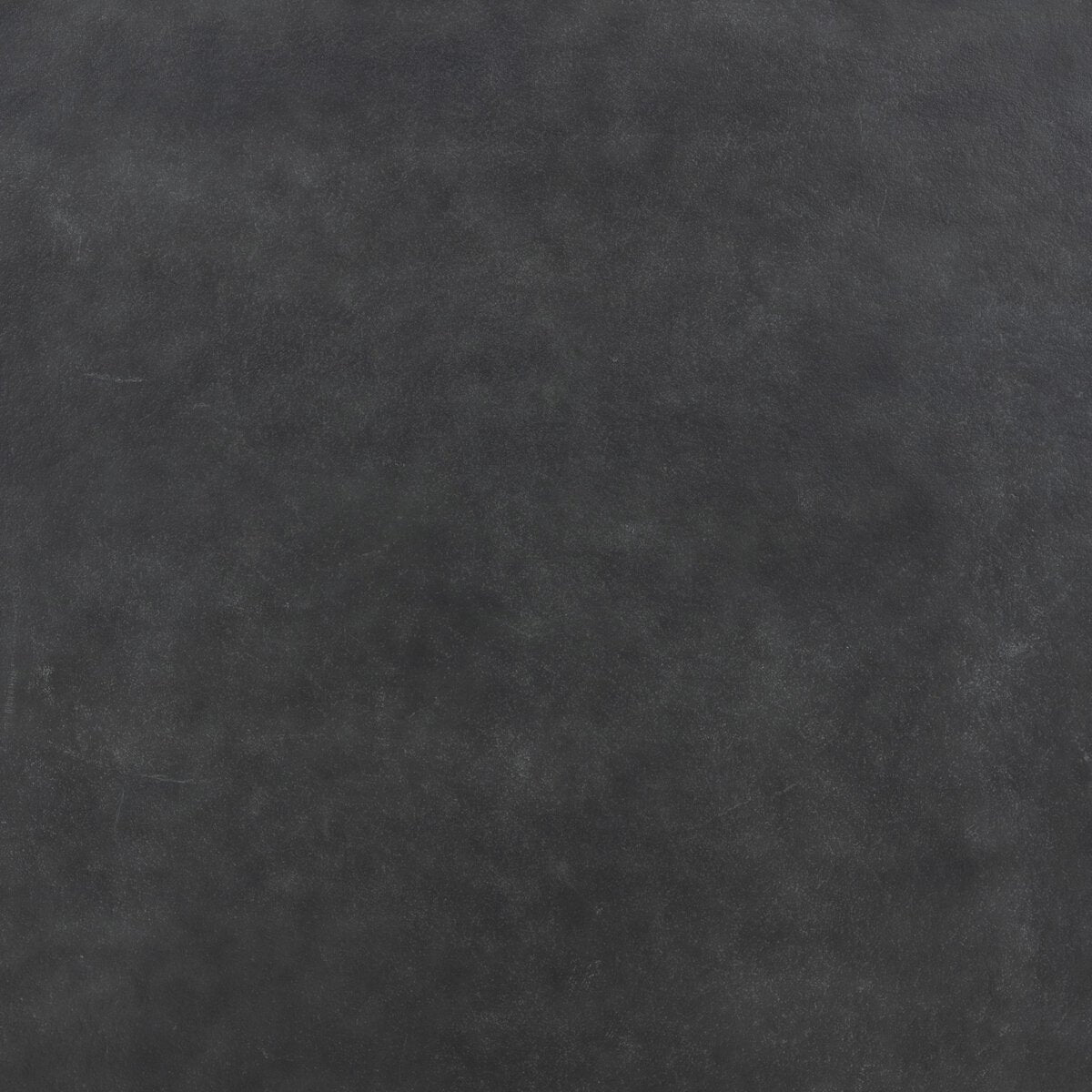 Aged Grey Metal Outdoor Coffee Table features a dark, smooth, and slightly textured surface with subtle shading variations reminiscent of natural slate.