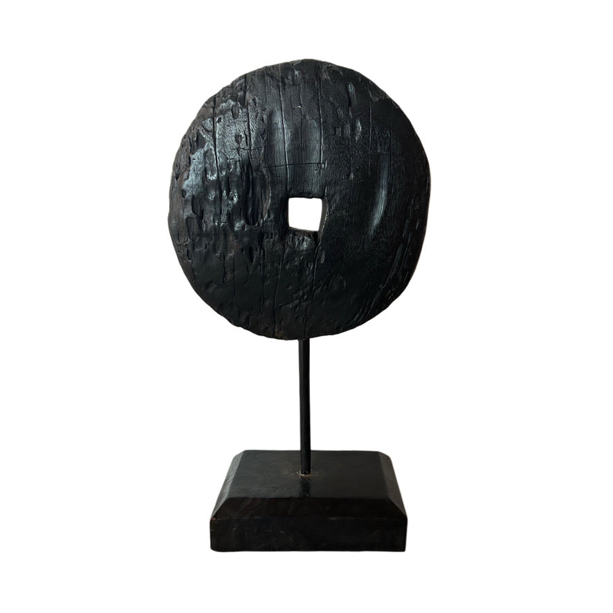 EBONIZED WOOD DISC ON STAND