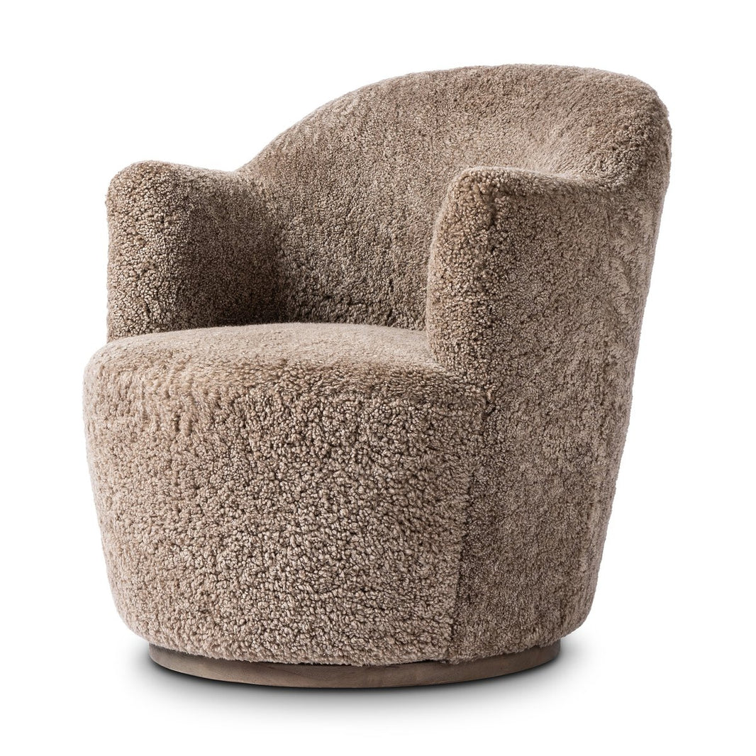 The Shierling Taupe Swivel Chair features a modern, cozy design with soft, teddy bear-like taupe upholstery and rounded arms and backrest, shown against a plain white background.