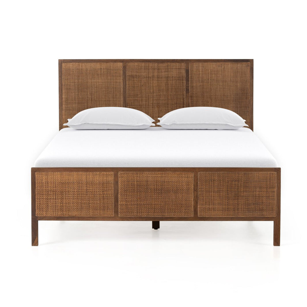 The Brown Mango Bedframe is a queen-sized wooden bed with woven rattan headboard and footboard, shown with a white mattress and two white pillows against a plain white background.