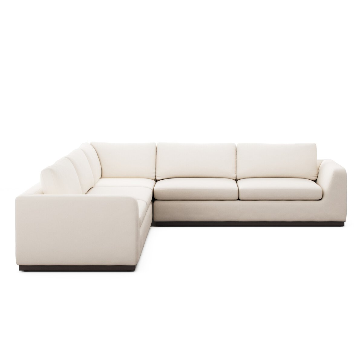 The Simple Modular Corner Sectional is an L-shaped sofa with plush cushions, low-profile arms and back, and off-white heirloom leather from Italian tanneries, shown against a plain white background.