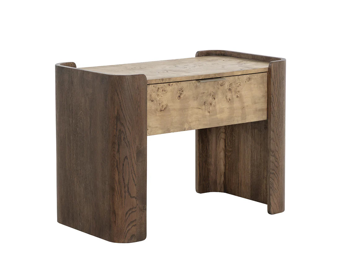The Two-Toned Wooden Nightstand features a minimalist design with curved dark wood sides and a lighter solid oak top and front panel, offering a sleek look without visible handles or drawers.