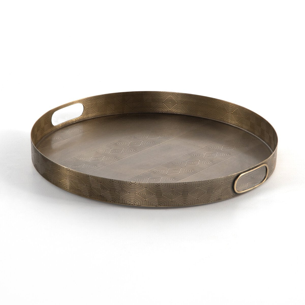 Etched Brass Round Tray, a 20-inch metal tray with integrated side handles and an etched geometric pattern.