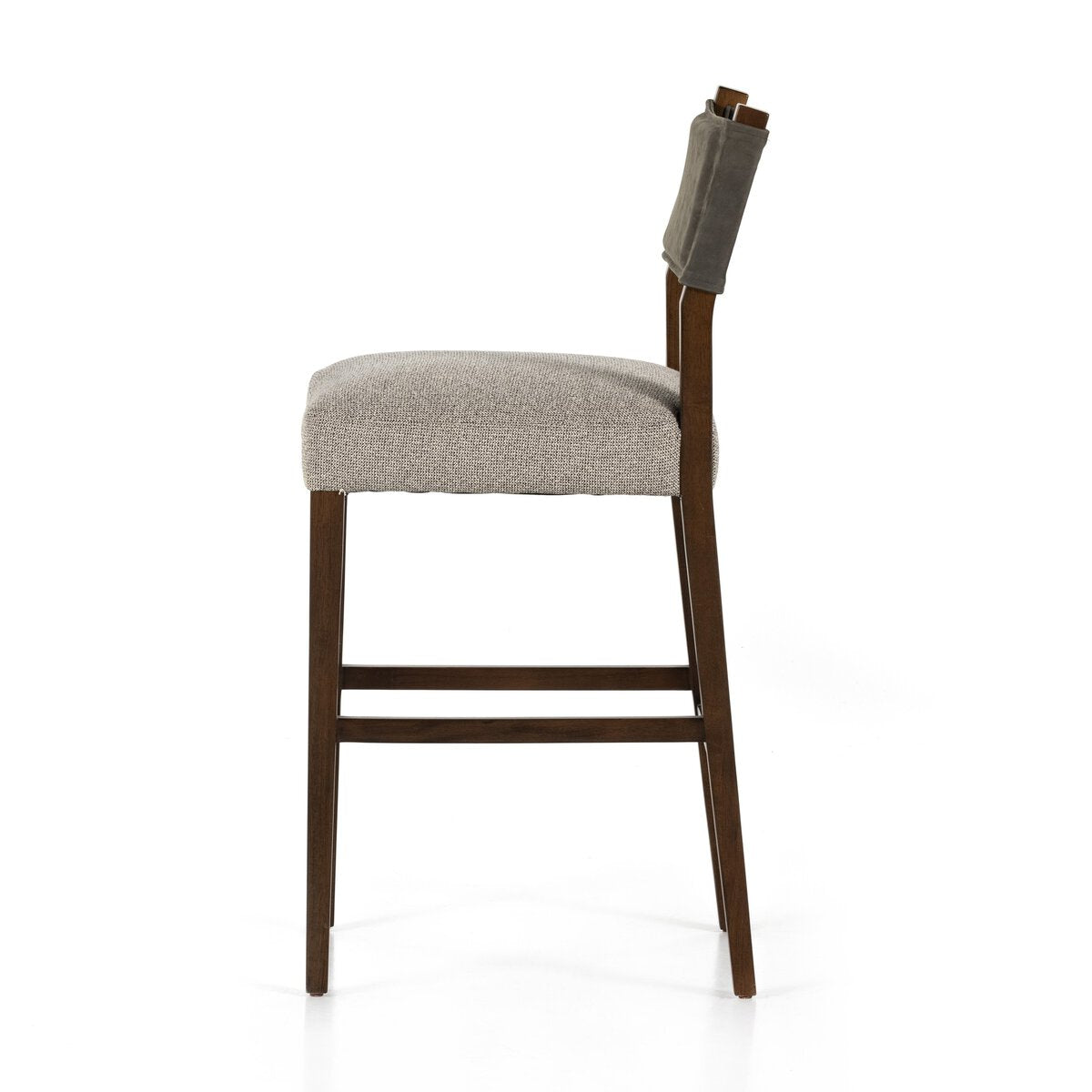 Side view of the Leather Back Bar Stool featuring a cushioned seat, wooden frame, and rectangular backrest in contrasting fabric. Overall dimensions: 20.00"w x 22.00"d x 42.75"h.