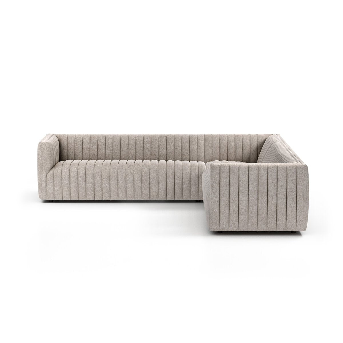 The Fluted Fabric L-Sectional is a modern, light gray sofa with vertical channel tufting on the back, seat, and sides, crafted in durable performance fabric upholstery and displayed against a plain white background.