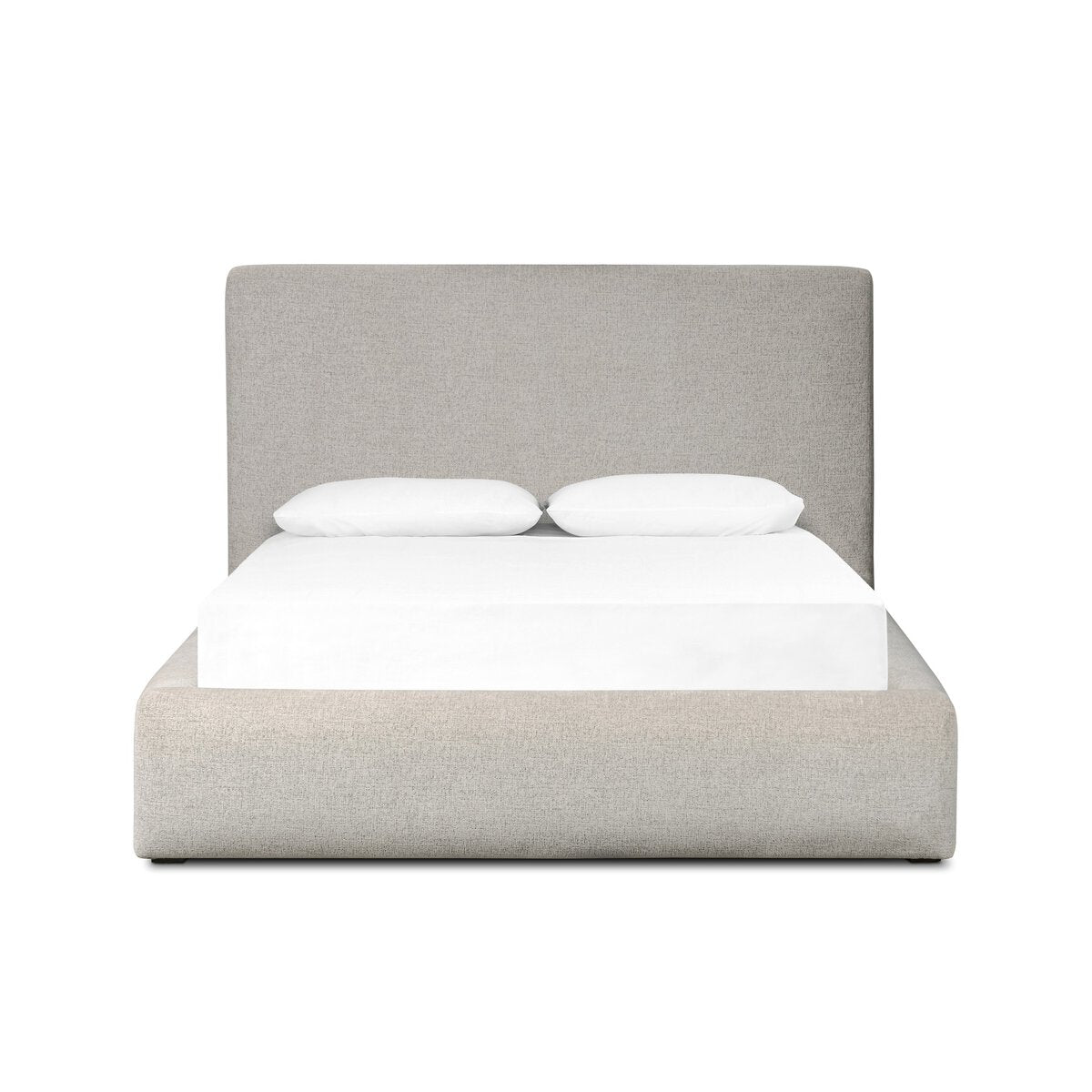 The Quincy Bed is a modern, minimalist king bed featuring a tall, light gray upholstered headboard and base, topped with a white mattress and two white pillows, set against a plain white background.