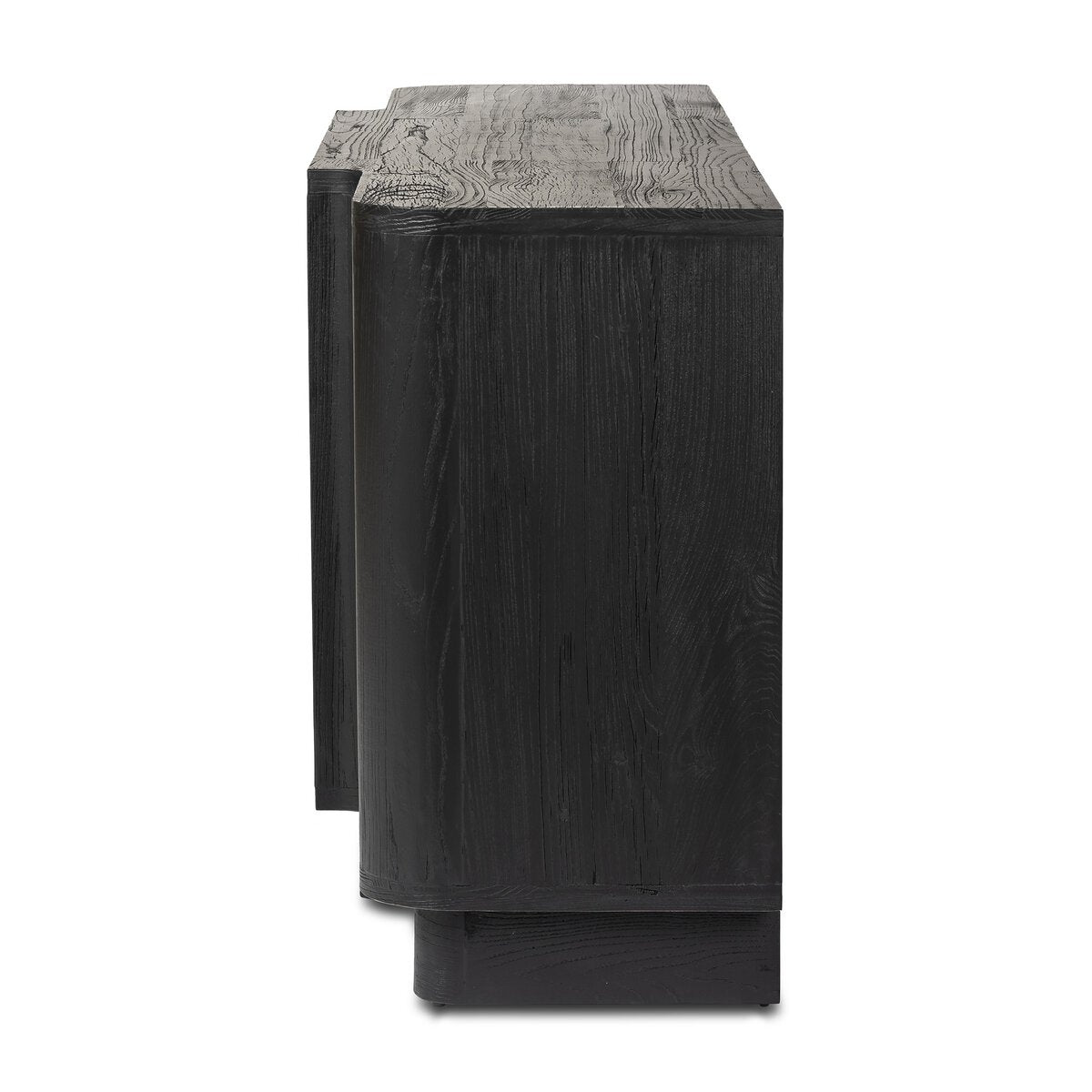 A side view of the Allandale Sideboard, a modern 72-inch black wooden cabinet with a textured surface, angular layered design, and standing on a short solid base.