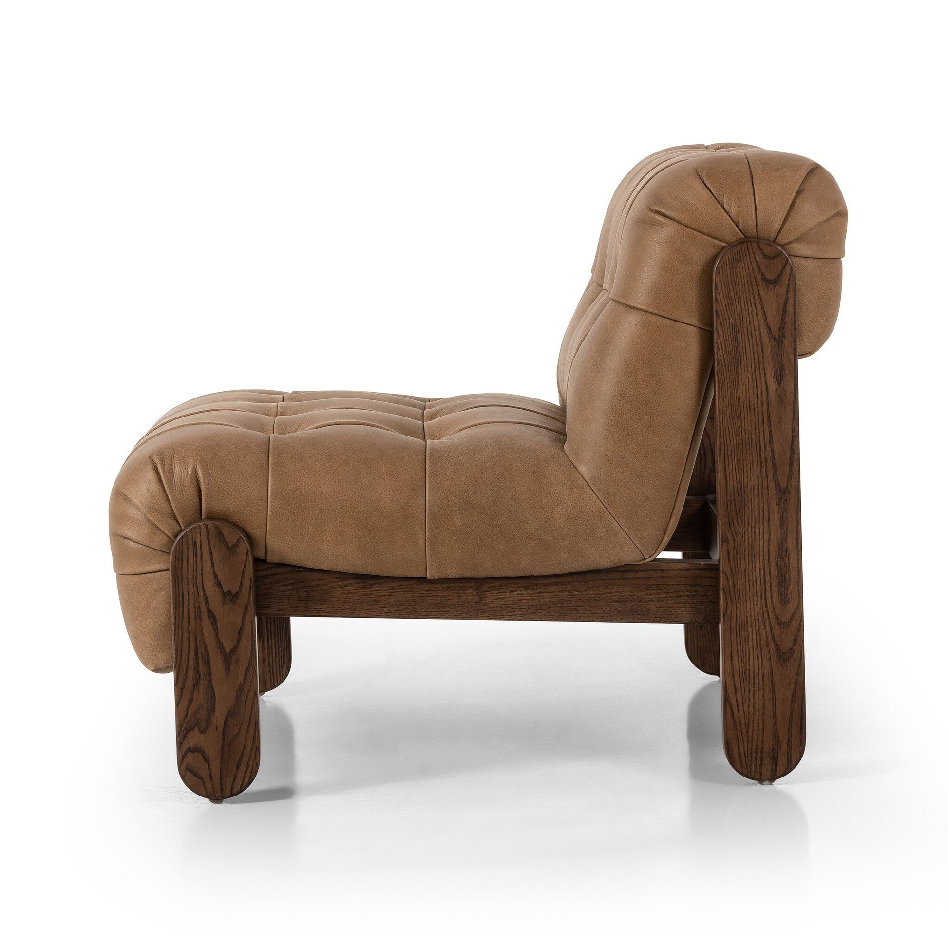 The Jeremiah Chair features tan tufted leather upholstery and a dark wooden frame, shown from the side against a white background. Overall dimensions are 35.5"D x 30"W.