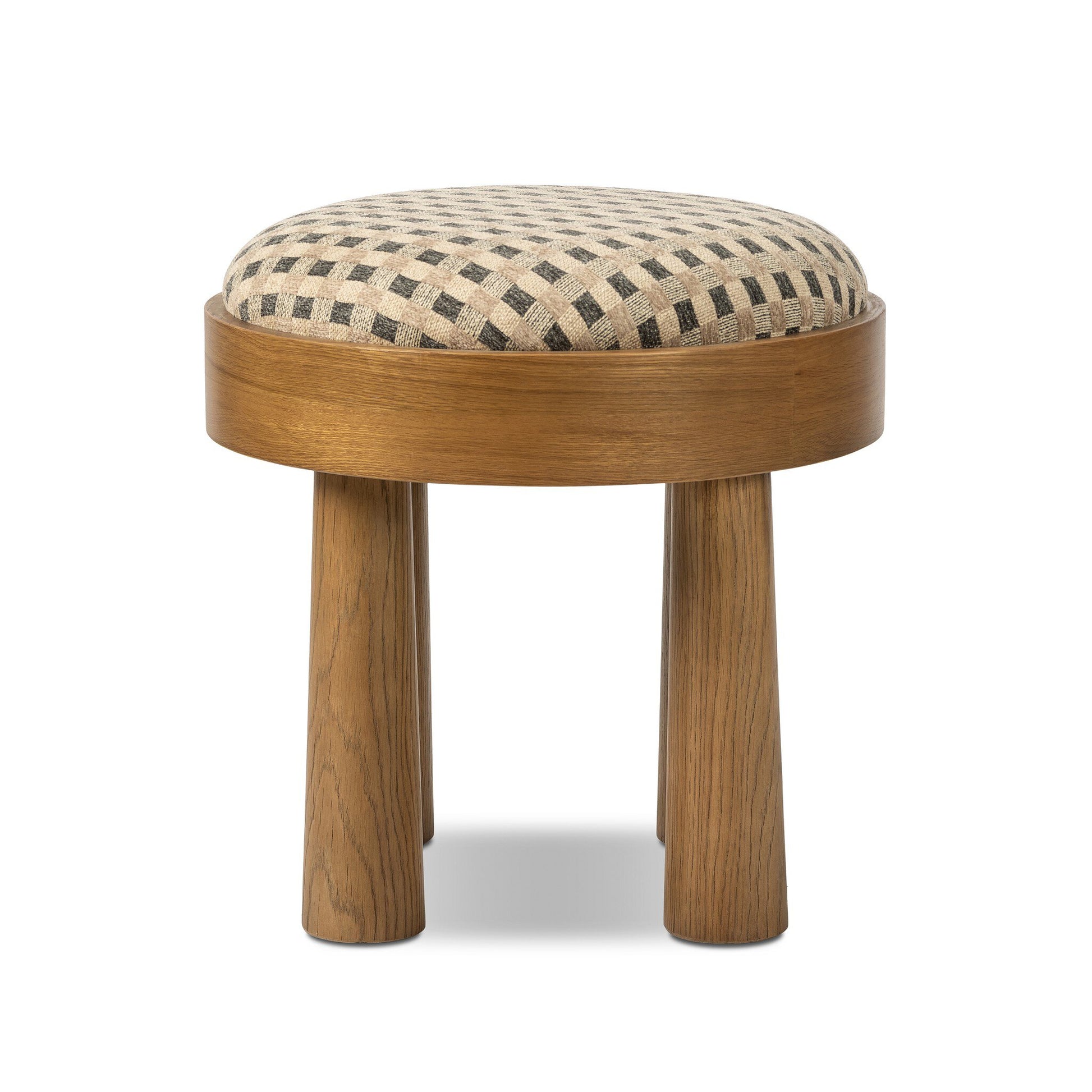 The Louise Accent Stool features a round wooden design with three sturdy legs and a beige cushioned seat adorned with a black checkered pattern—ideal as an accent table—displayed against a white background.