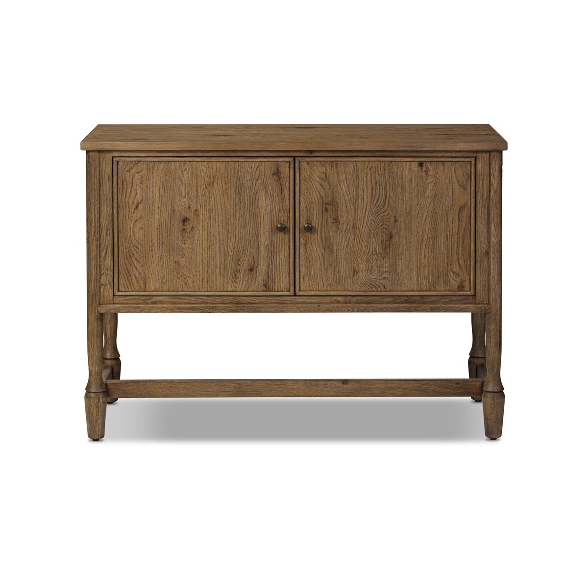 The Bari Sideboard 46" is a wooden cabinet with two doors, round knobs, a natural wood grain finish, and four legs joined by a base support bar. Dimensions: 46.00"w x 19.00"d x 33.00"h.