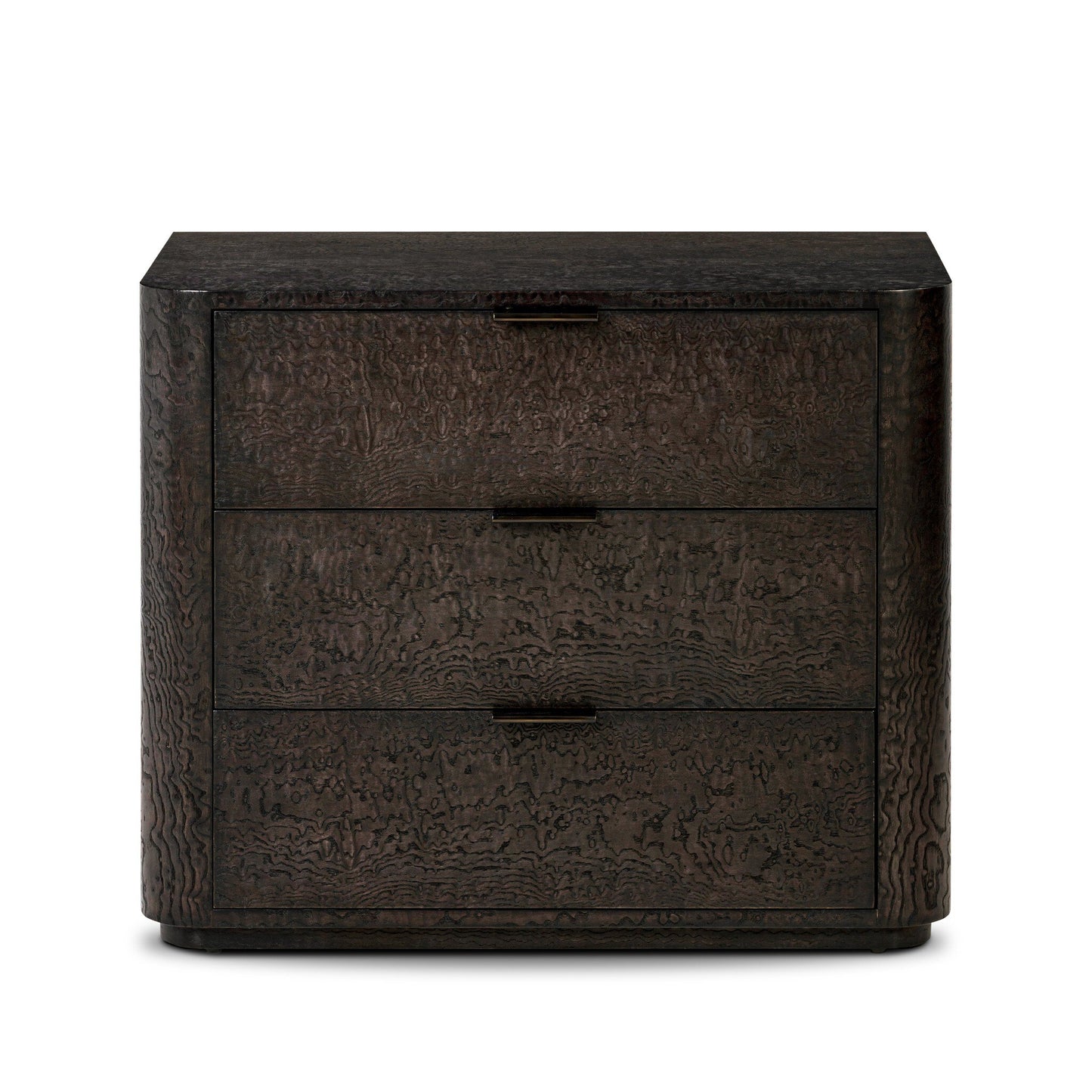 The Stenson 3 Drawer Nightstand features dark wood, three drawers with rectangular pulls, textured wavy grain, and softly rounded corners. Its modern design measures 32"w x 20"d x 26.5"h, perfect for contemporary spaces.