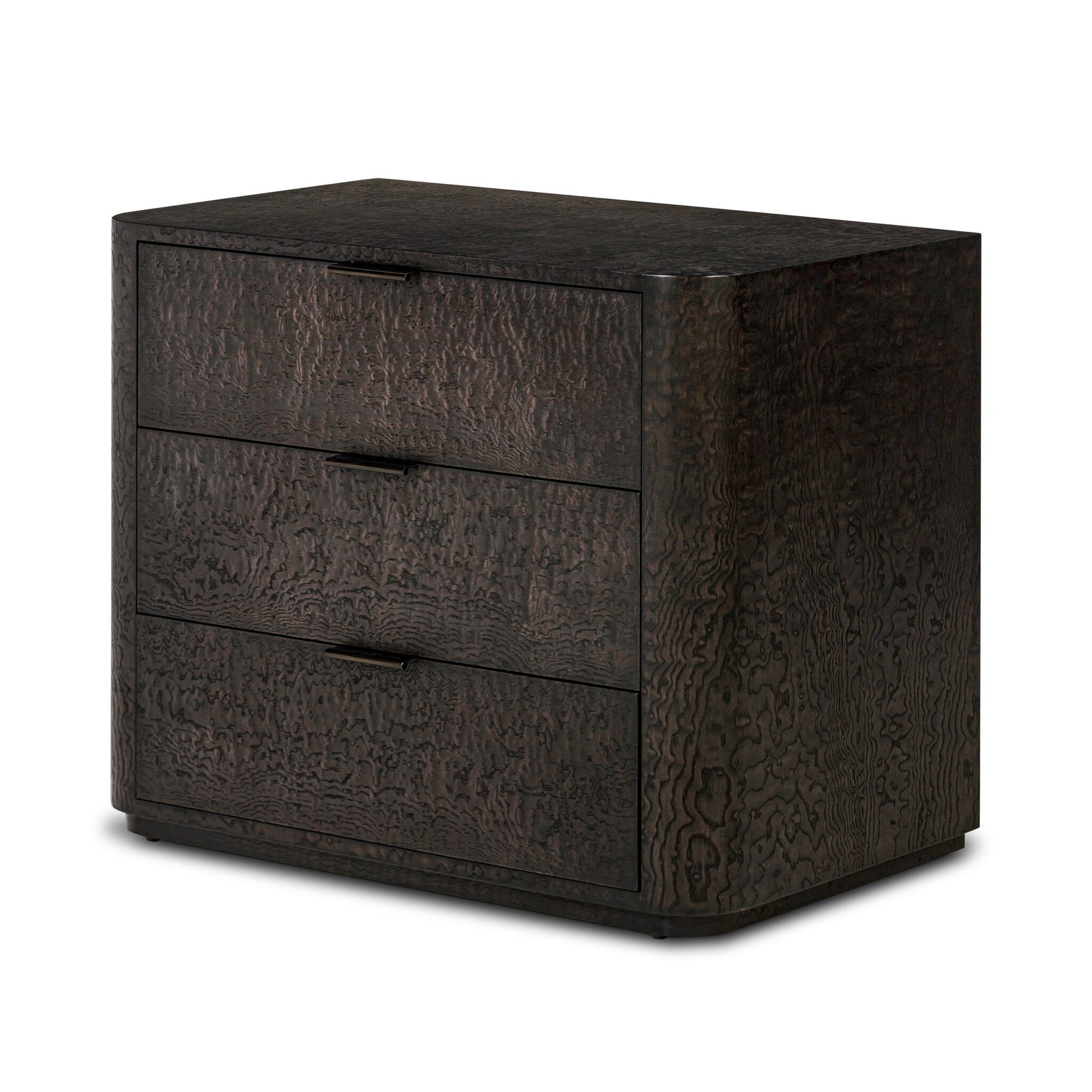 The Stenson 3 Drawer Nightstand features a dark wood finish, wavy textured grain, rounded edges, and slim horizontal handles. Measuring 32"w x 20"d x 26.5"h, it stands on a flat base for a sleek look.