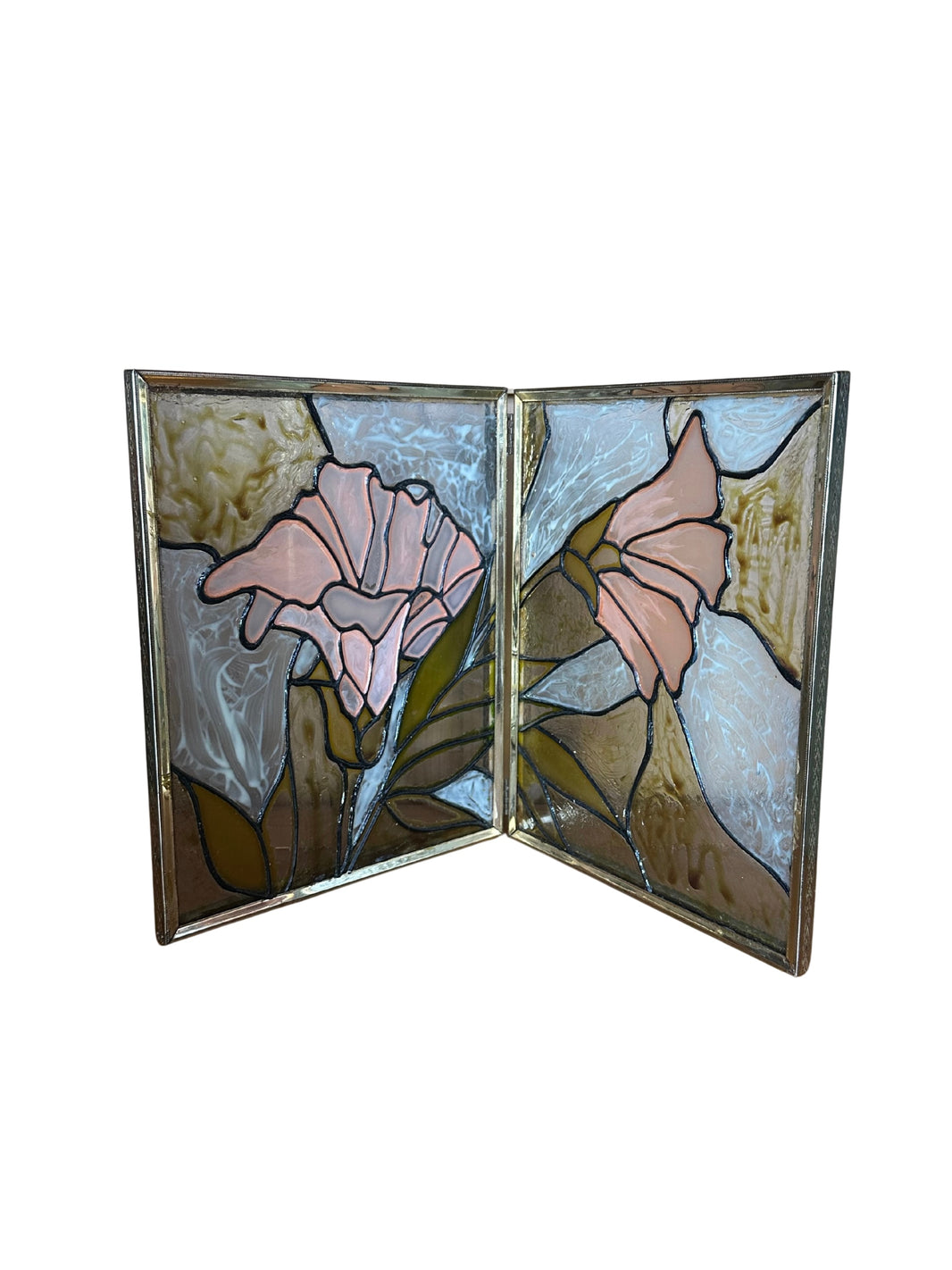 The Art Deco Stained Glass Decor features two pink flowers with green leaves and stems, trimmed in gold and set against a swirled background of white, brown, and gold glass.