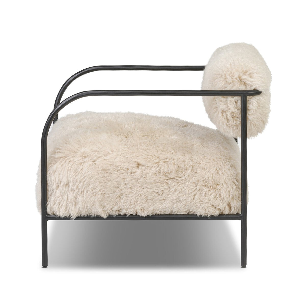 The Iron and Fur Chair features a hammered iron frame with a plush cream Mongolian fur seat and a matching round backrest cushion, adding modern style to any space.