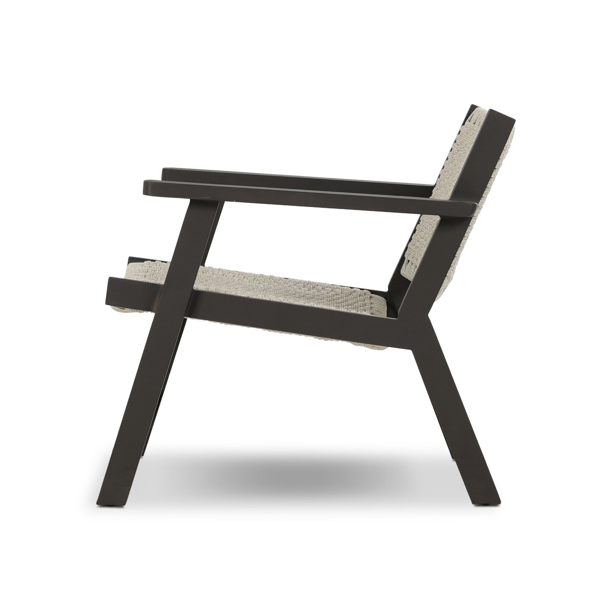 Side view of the Polypropylene Woven Rope Outdoor Armchair, showcasing a black metal frame with light-colored, textured woven rope seat and backrest, set against a plain white background.