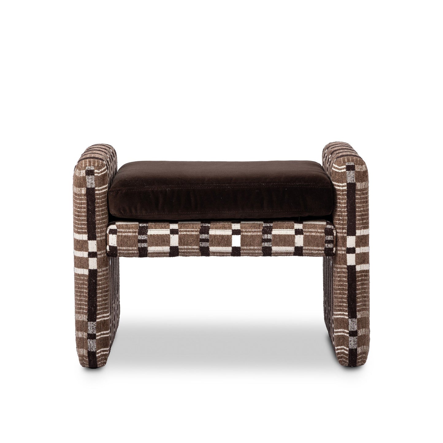 The Serena Ottoman features a brown cushioned seat and thick rectangular armrests with a plaid pattern in brown, beige, and white. Its dimensions are 18.00"d x 26.00"w, shown against a white background.
