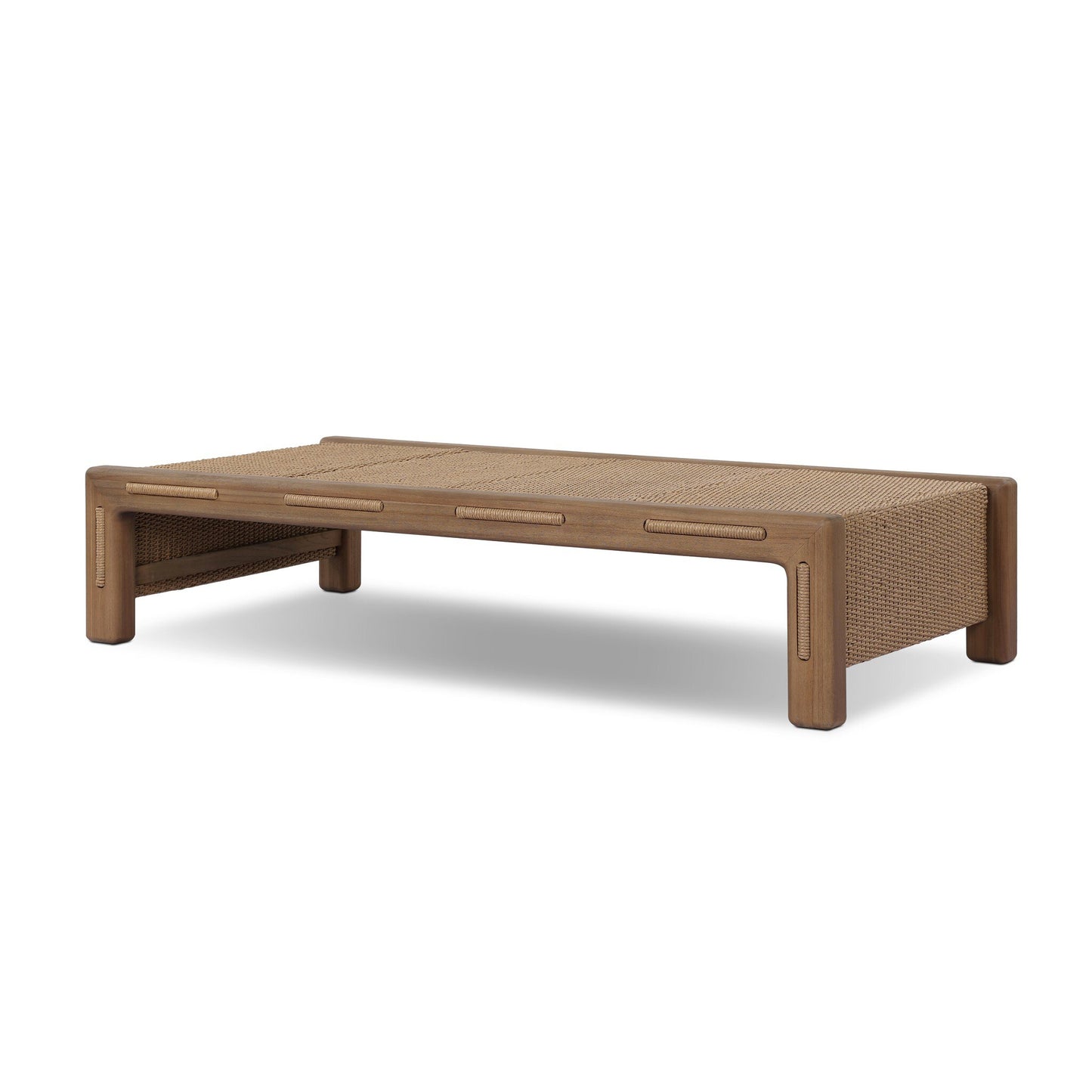 The FSC-Certified Teak Woven Slats Outdoor Coffee Table features a light brown teak frame with woven rattan top and sides, rounded legs, and a minimalist, modern rectangular design perfect for outdoor spaces.