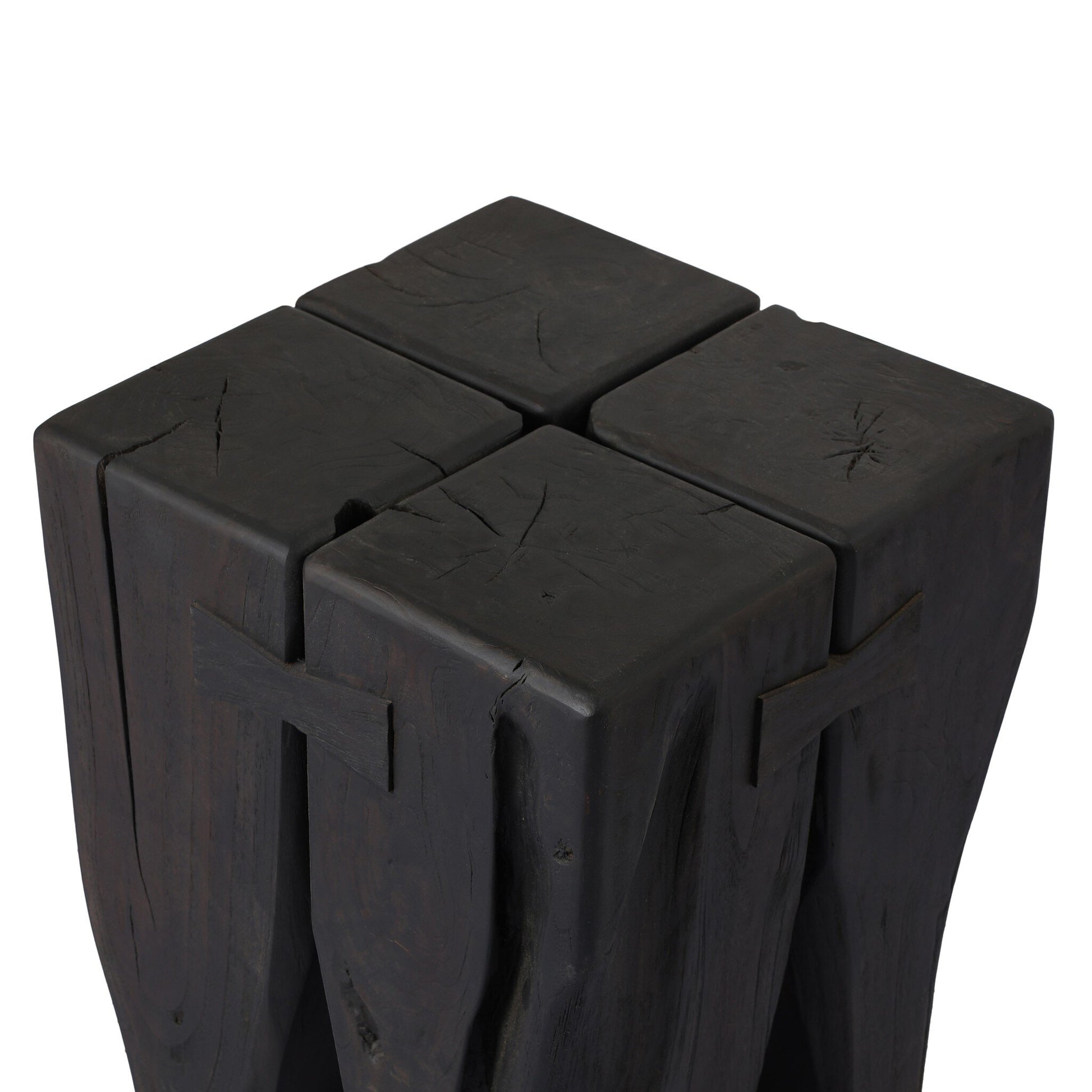 A close-up of the FSC Teak Tiered Pillar Outdoor End Table shows its chunky, pillar-style legs and rustic handcrafted appeal, featuring natural wood cracks for a unique look.