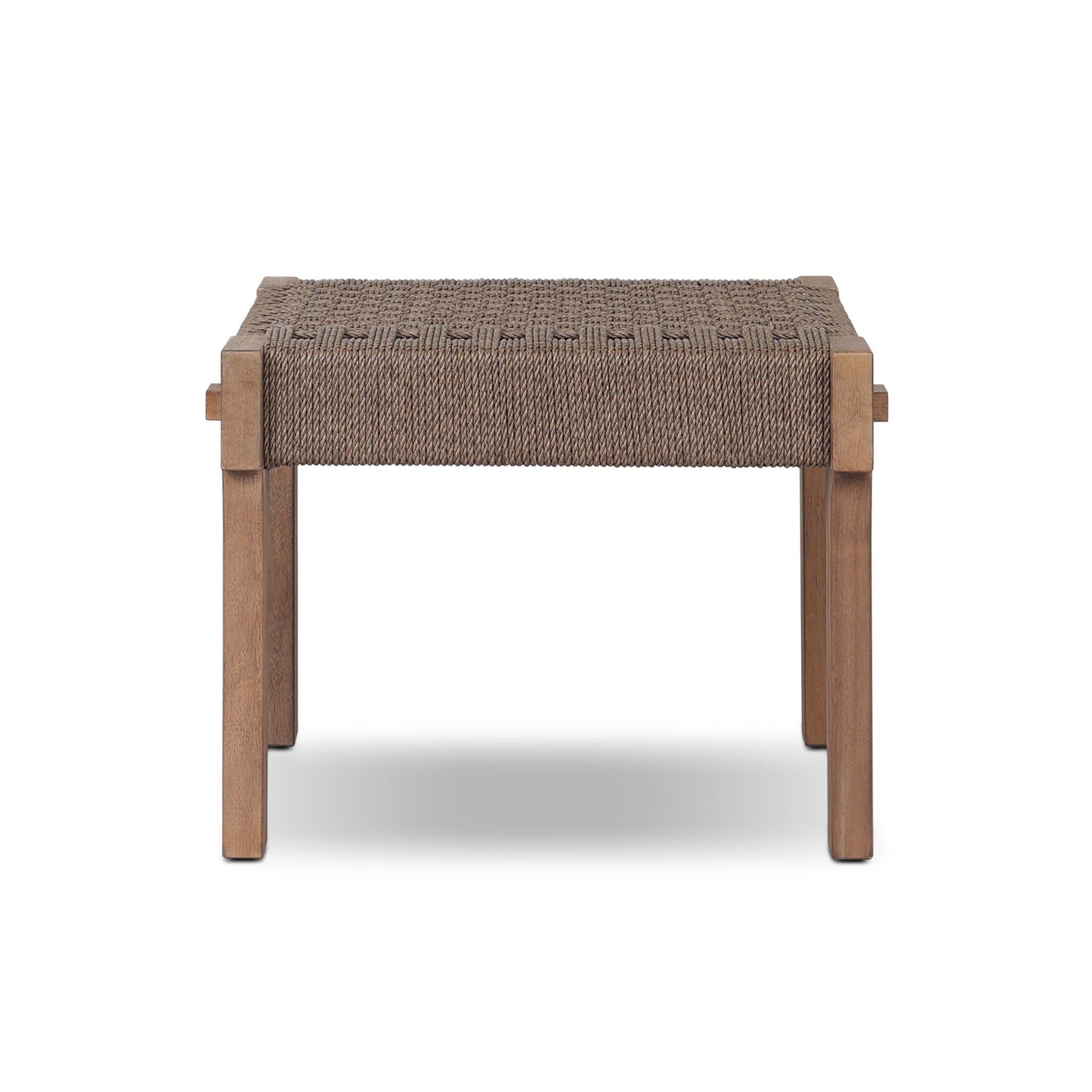 The Woven Teak | Handcrafted Outdoor Accent Stool features a solid rectangular teak frame with four legs and a brown woven rope seat, displayed against a plain white background.