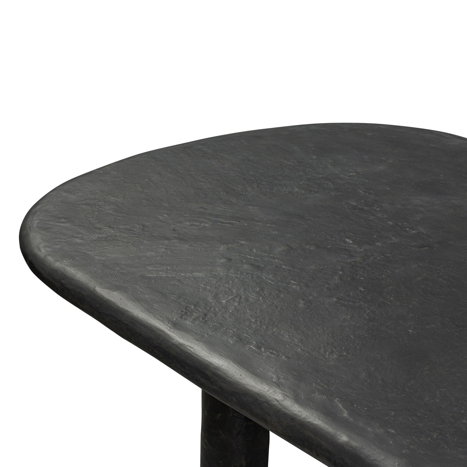 A close-up of the Obsidian Concrete Softened Rectangle | Dining Table, showcasing its U-shaped legs and a concrete tabletop with an obsidian finish.