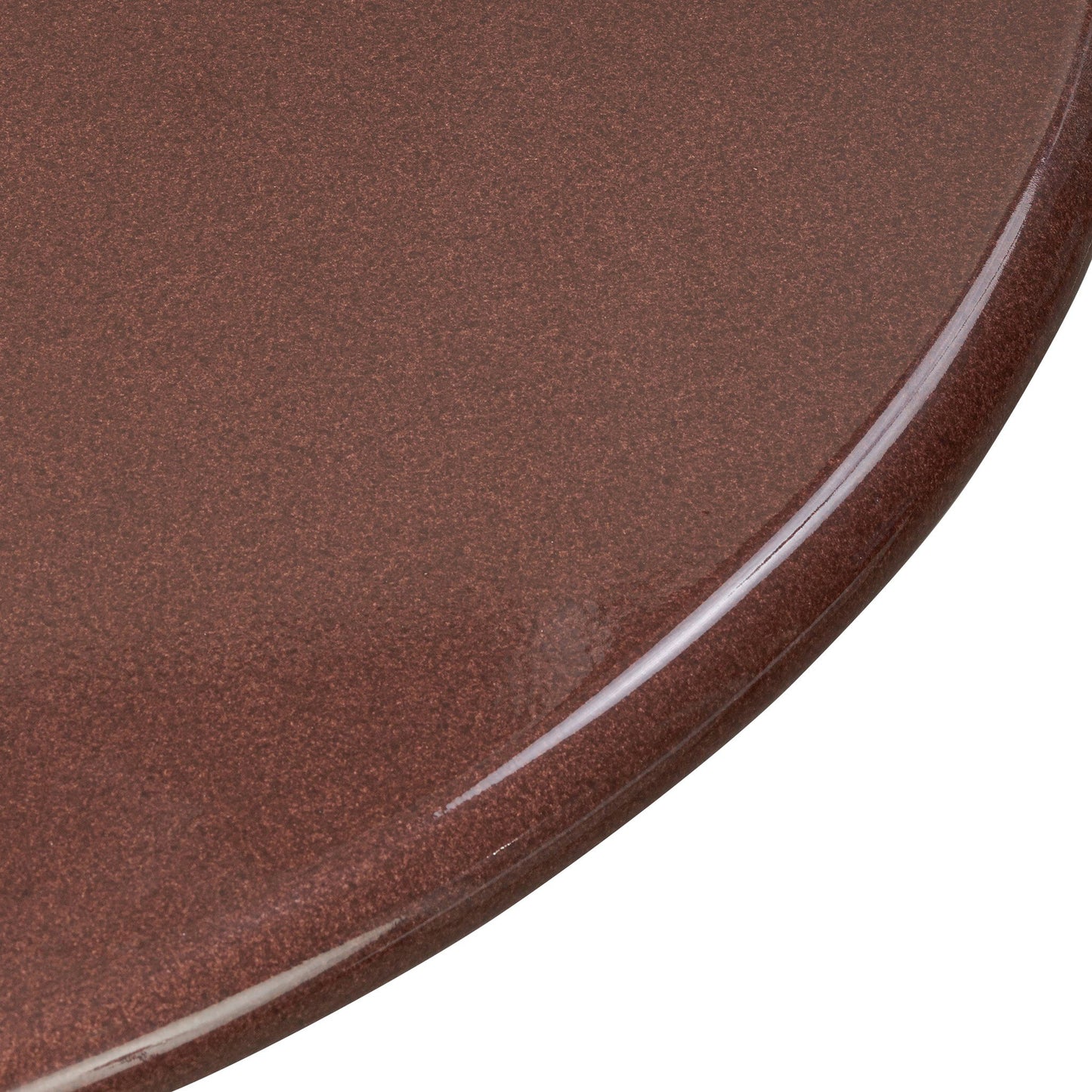 A close-up of the unique texture and sleek finish of the Solid Concrete Rounded Top | Dining Table's brown surface.