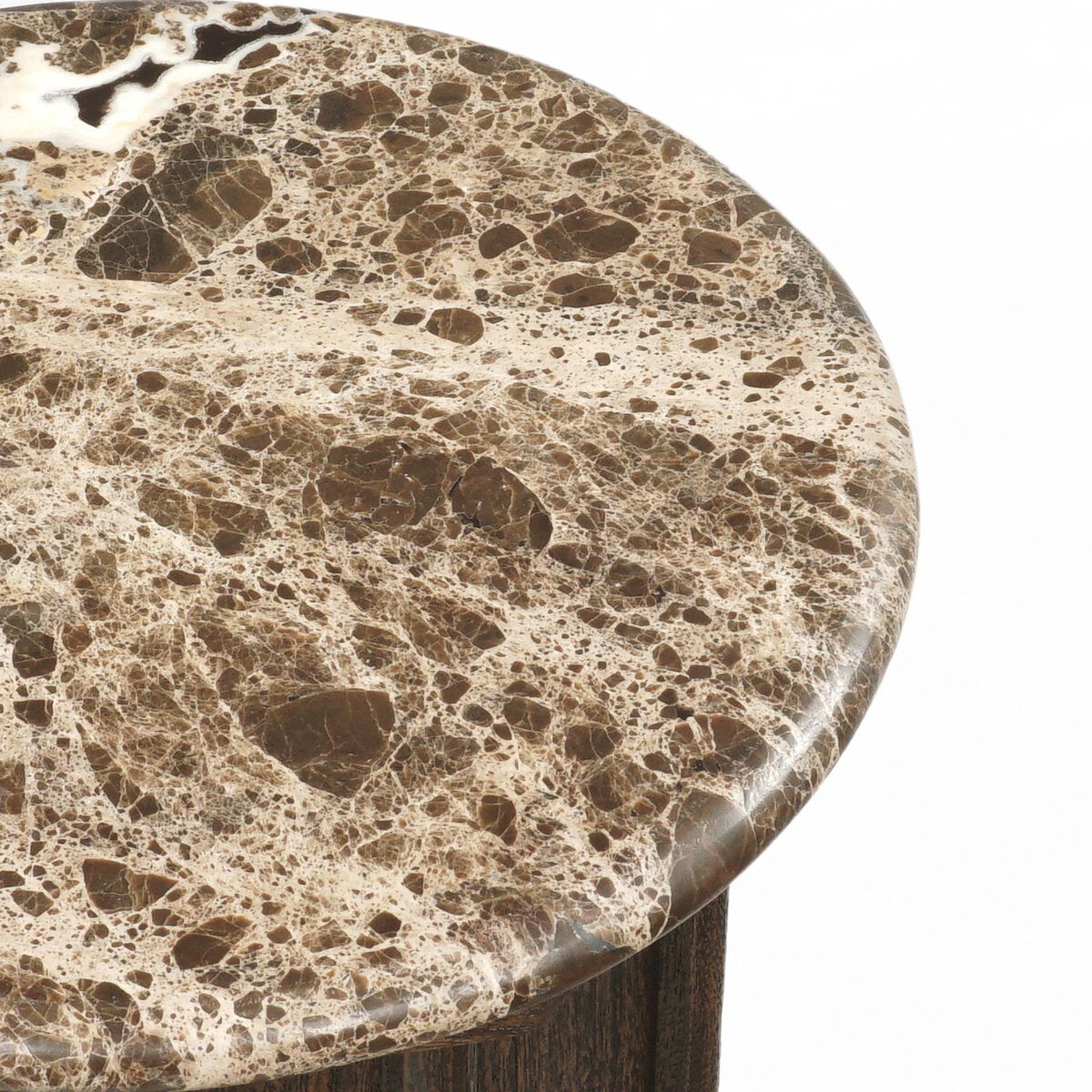 Close-up of the Pavlo End Table’s round, polished brown marble tabletop with light beige and dark brown veining, a smooth glossy finish, and rounded edge; overall dimensions: 11.00"W x 11.00"D x 21.00"H.
