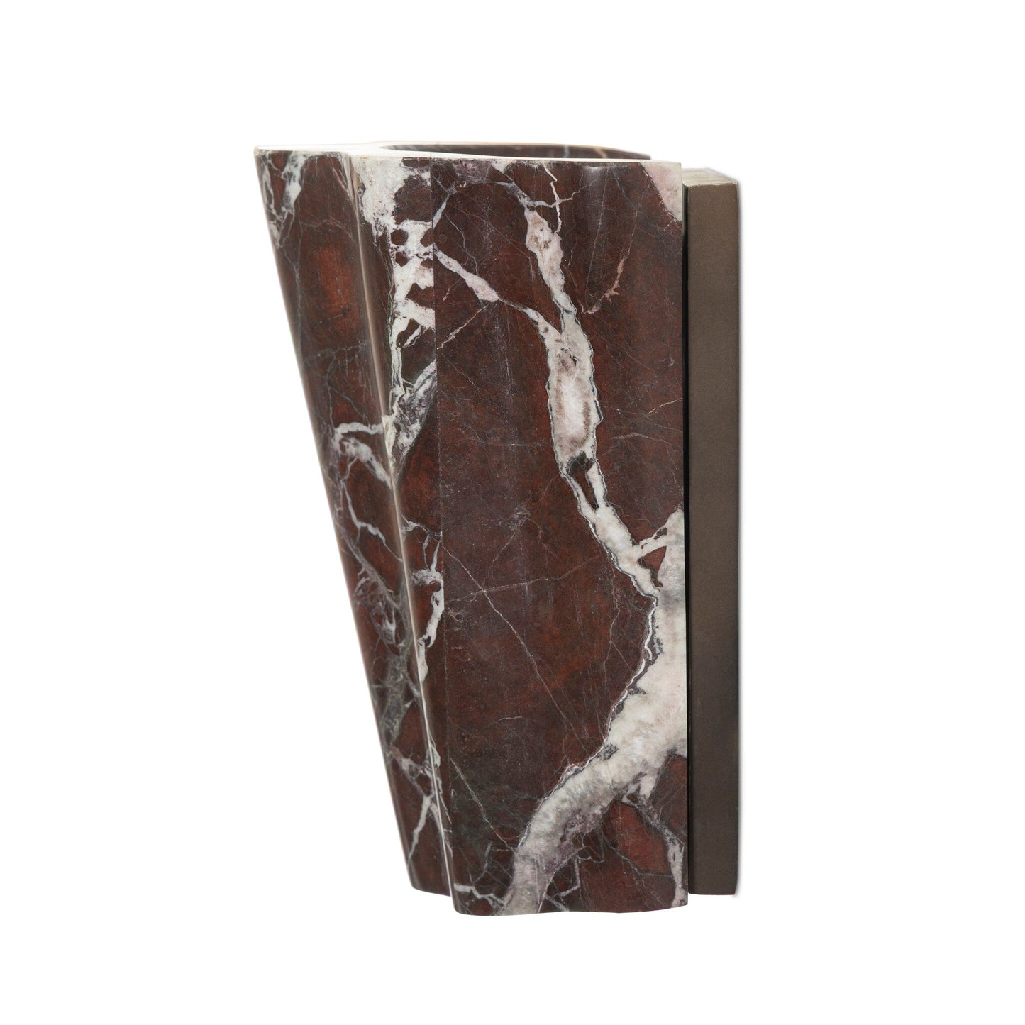 The Astra Sconce features an asymmetrical, sculptural design in dark brown marble with white veining and a bronze accent along one edge; overall dimensions are 8.50w x 4.50d x 7.75h, shown isolated on a white background.