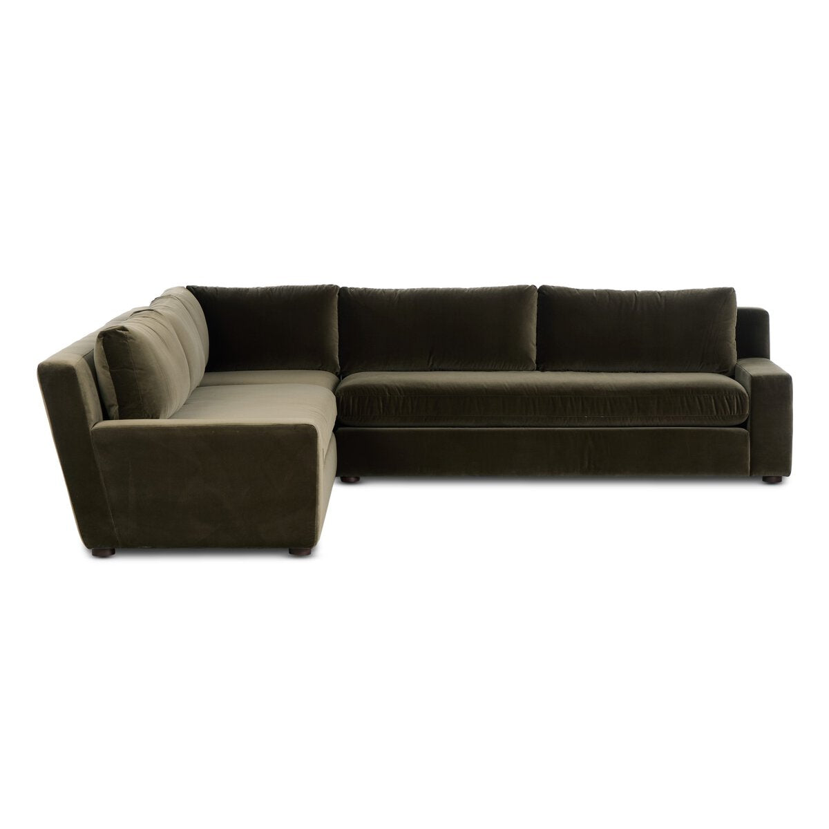 The Track Arm Modular Sectional is a large, dark green velvet sofa with plush foam cushions and a sleek L-shape design, offering comfortable back and seat support, shown against a plain white background.