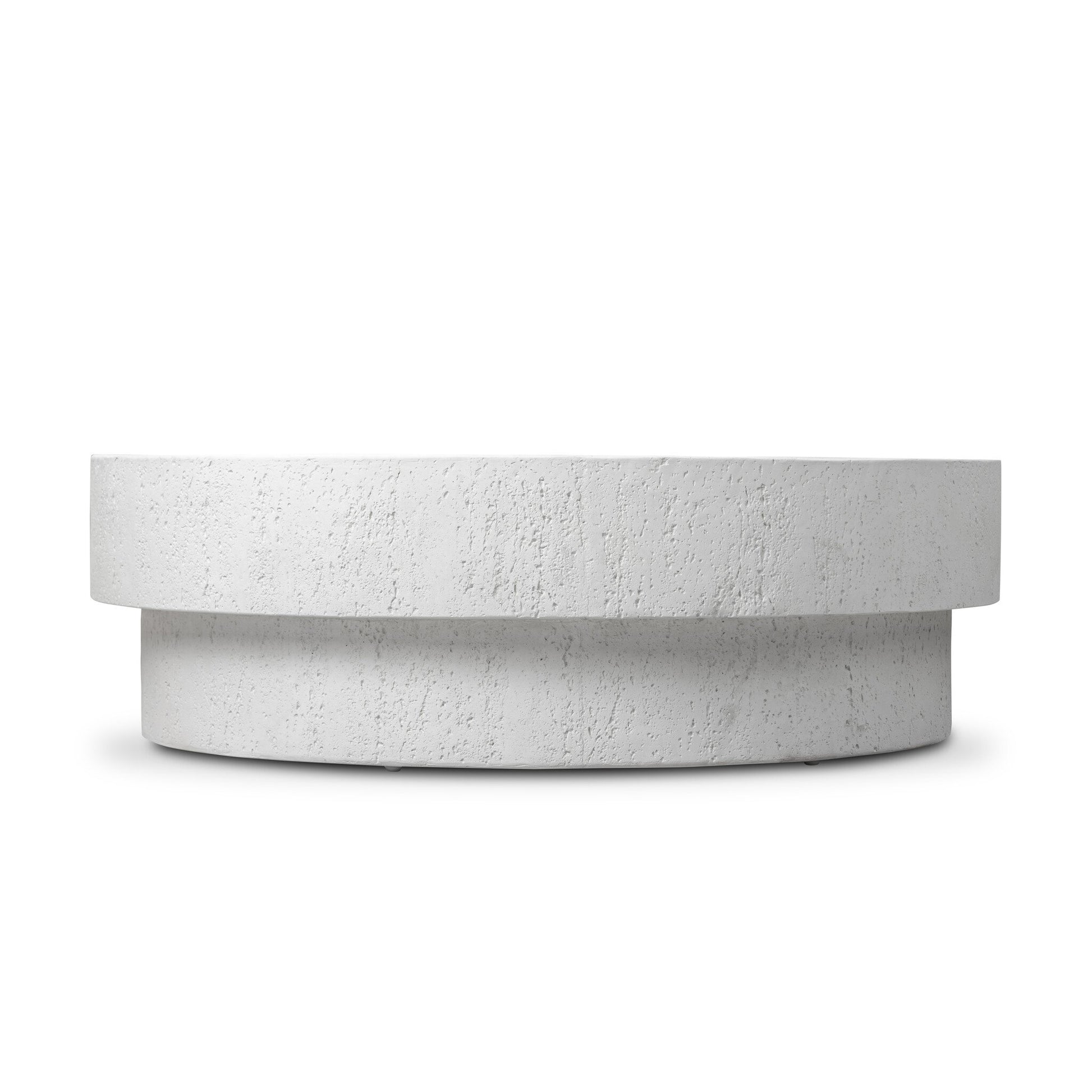 The Solid Concrete Plinth-Style Outdoor Coffee Table features a minimalist round design with a textured white surface, thick top, and slightly recessed cylindrical base, displayed against a white background.