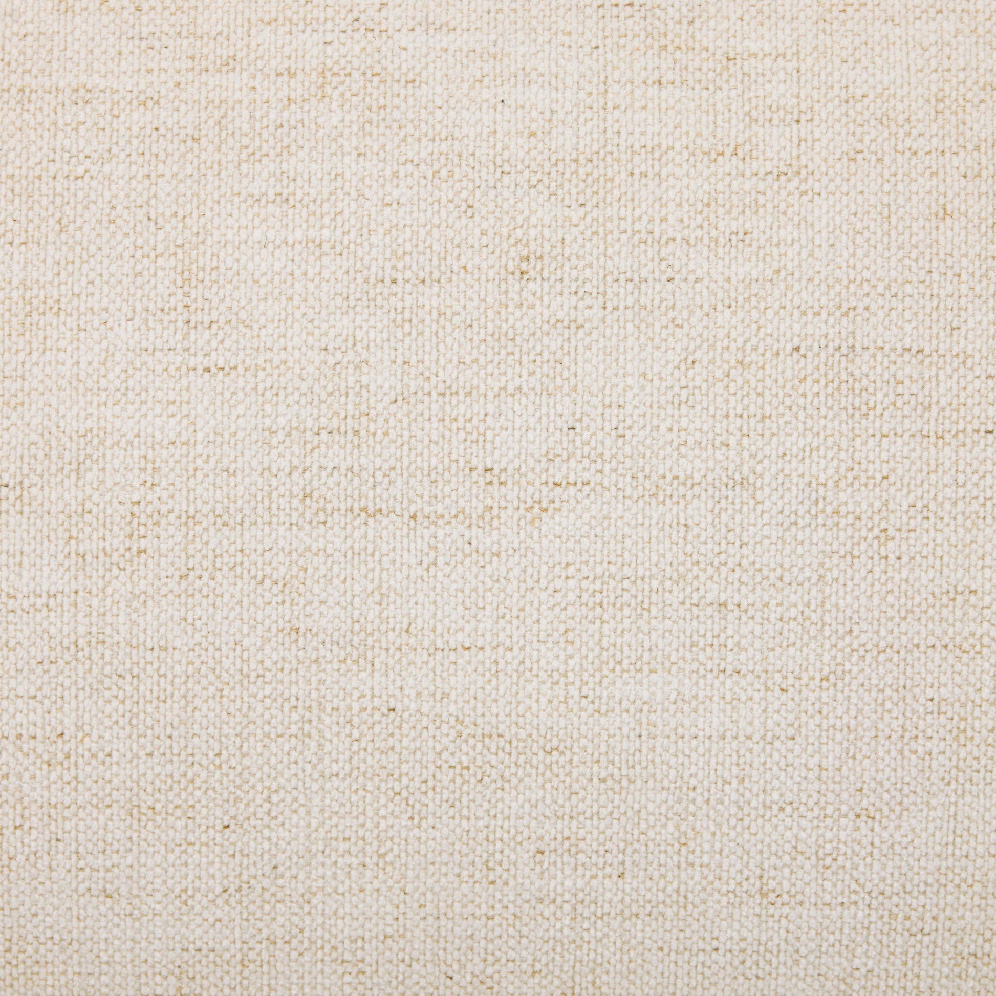 Close-up of a beige, woven fabric texture on the Jenning Sofa - 85". The soft, slightly rough surface features small fibers and natural color variations—ideal for anyone considering precise couch measurements.