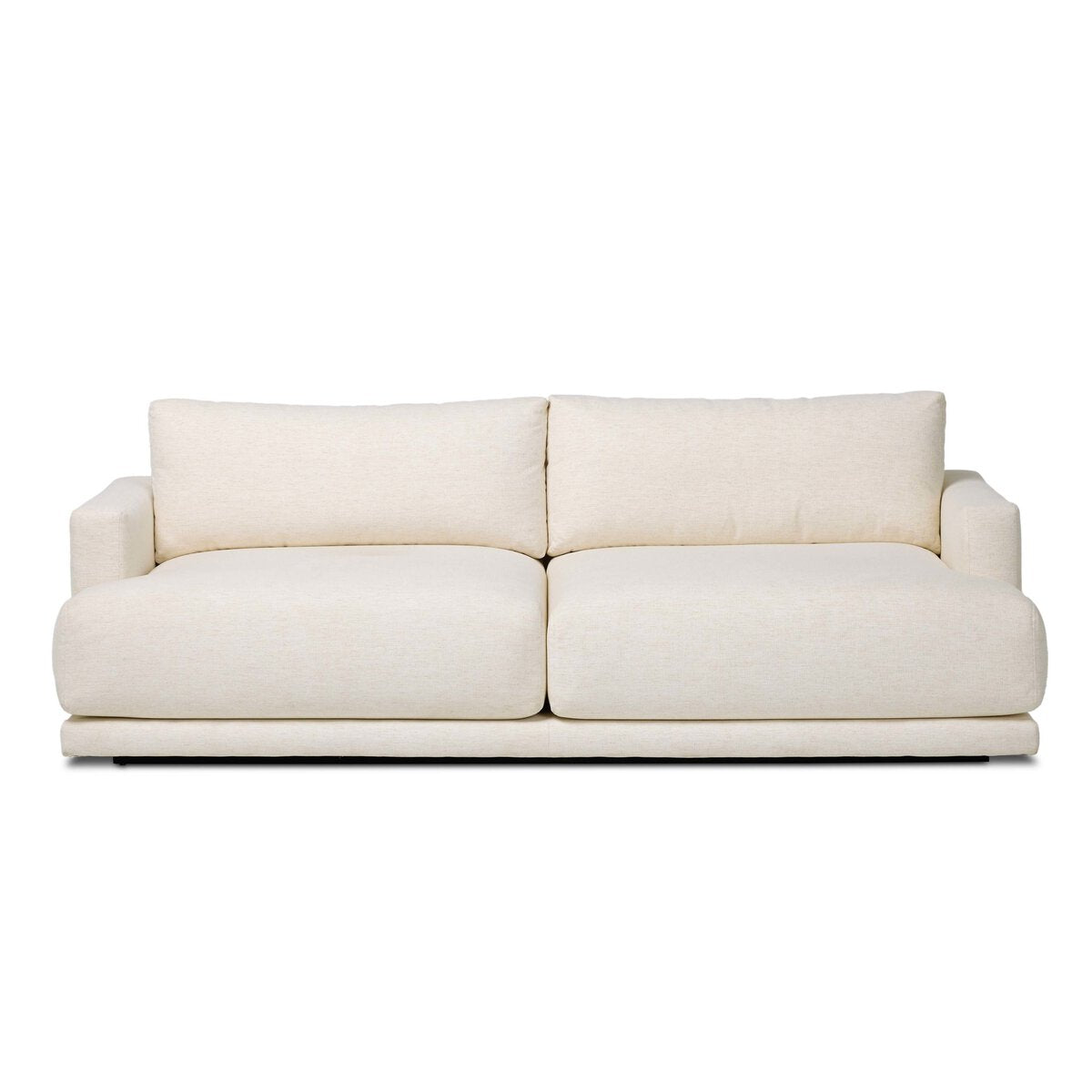 The Jenning Sofa - 85" is a modern, cream-colored piece with wide padded arms and plush cushions. Check its 85-inch length to ensure it fits perfectly in your space.